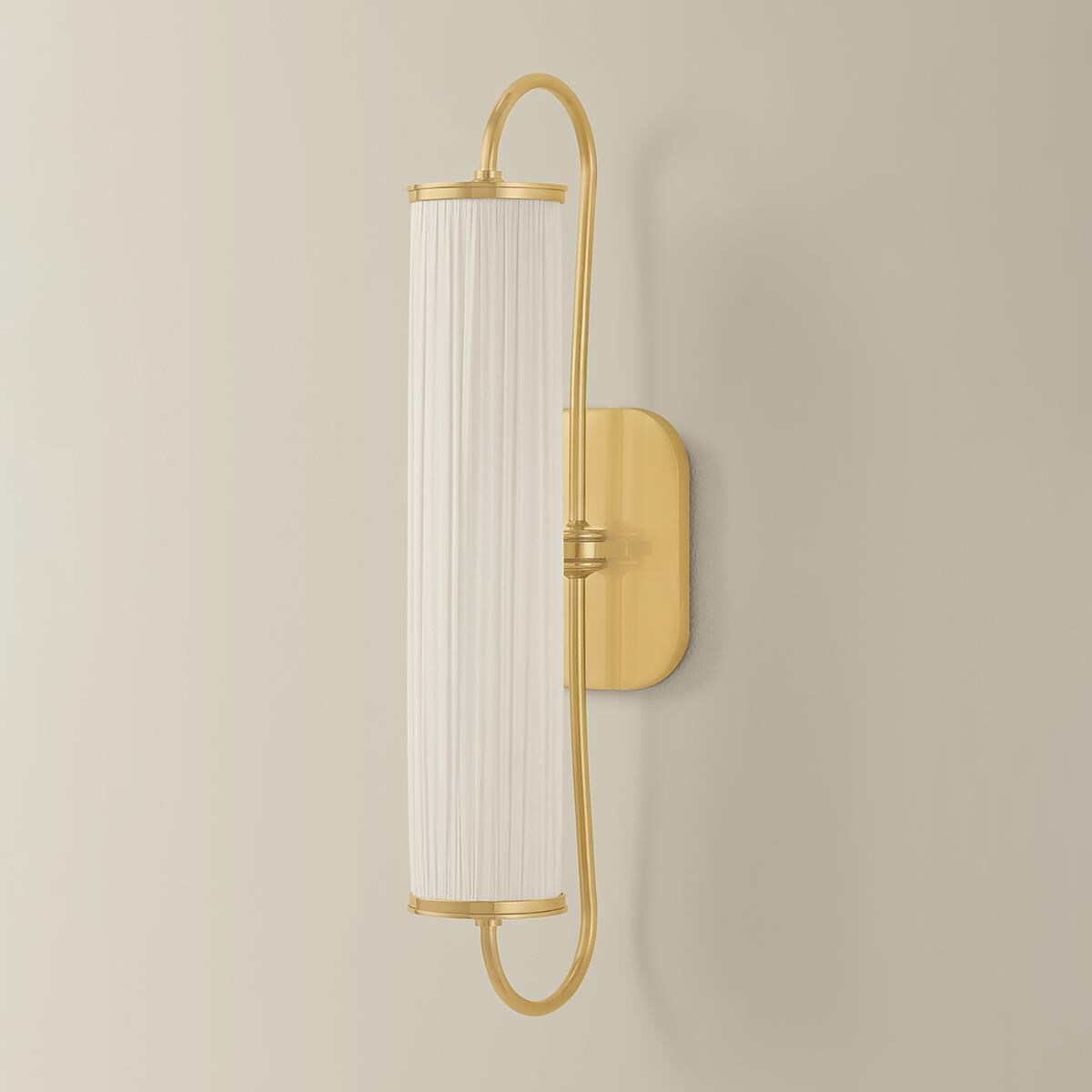 Shown in Aged Brass finish and Ivory Silk shade