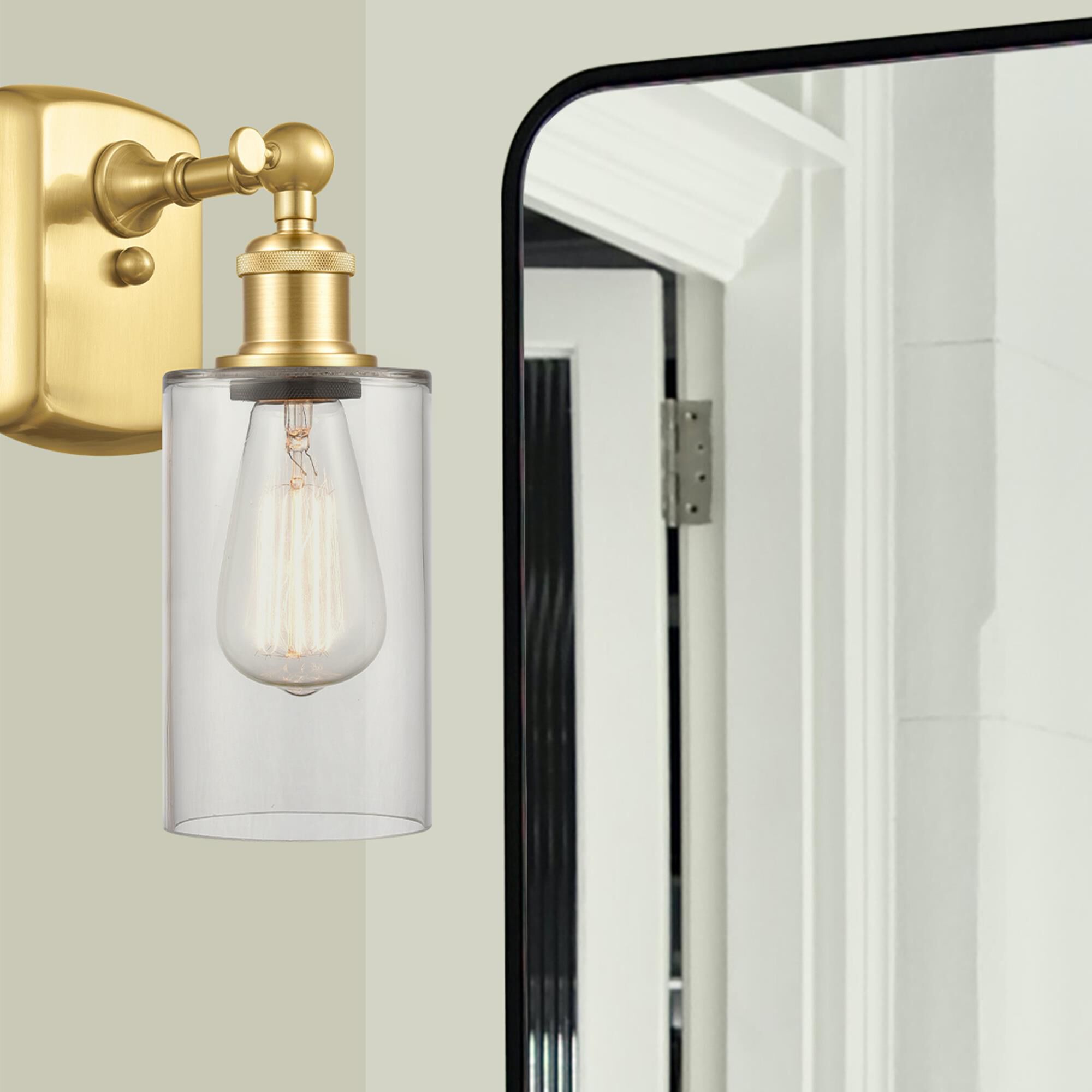 Shown in Satin Gold finish and Drum glass and Glass shade and Polished Chrome accent