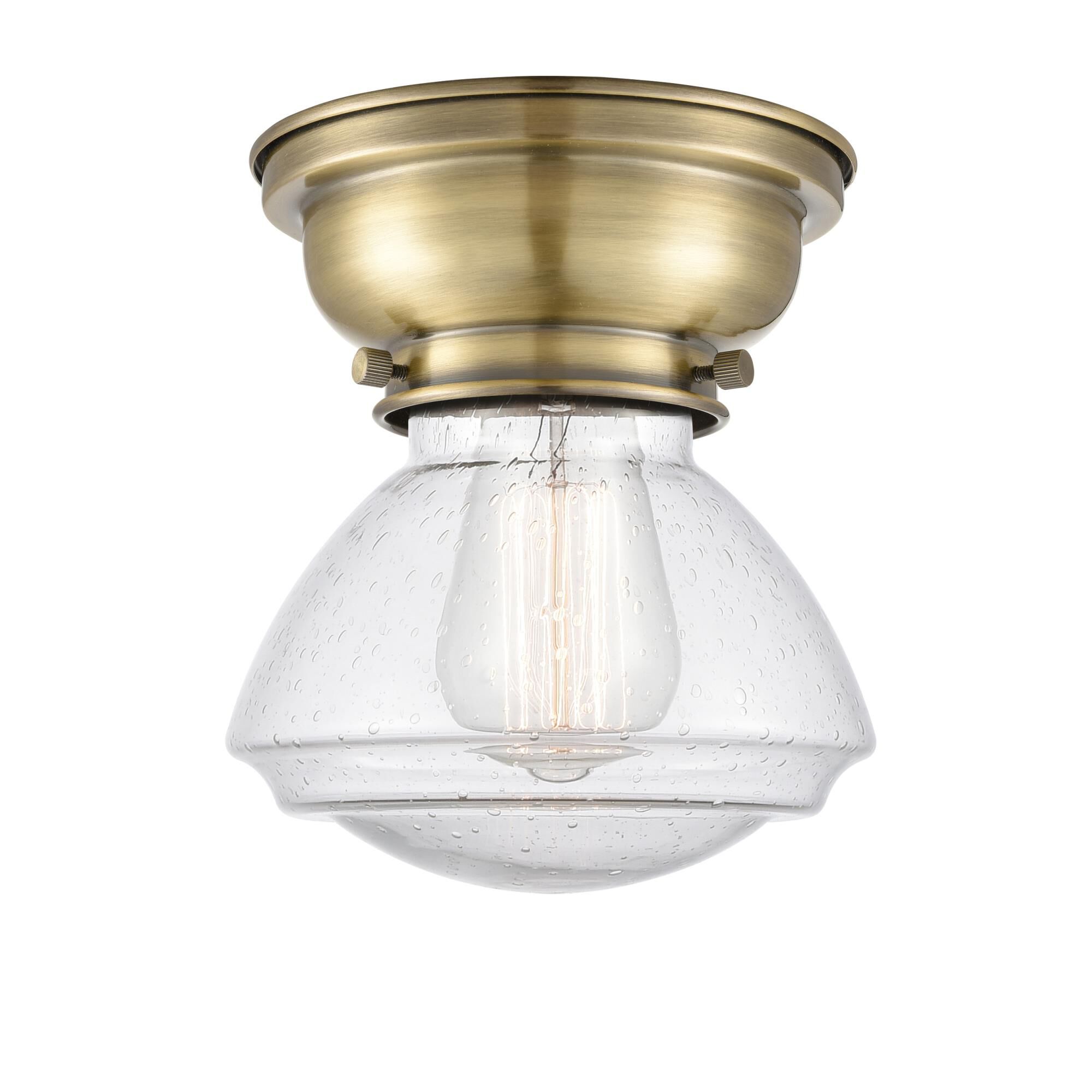 Shown in Antique Brass finish and Bell glass and Glass shade