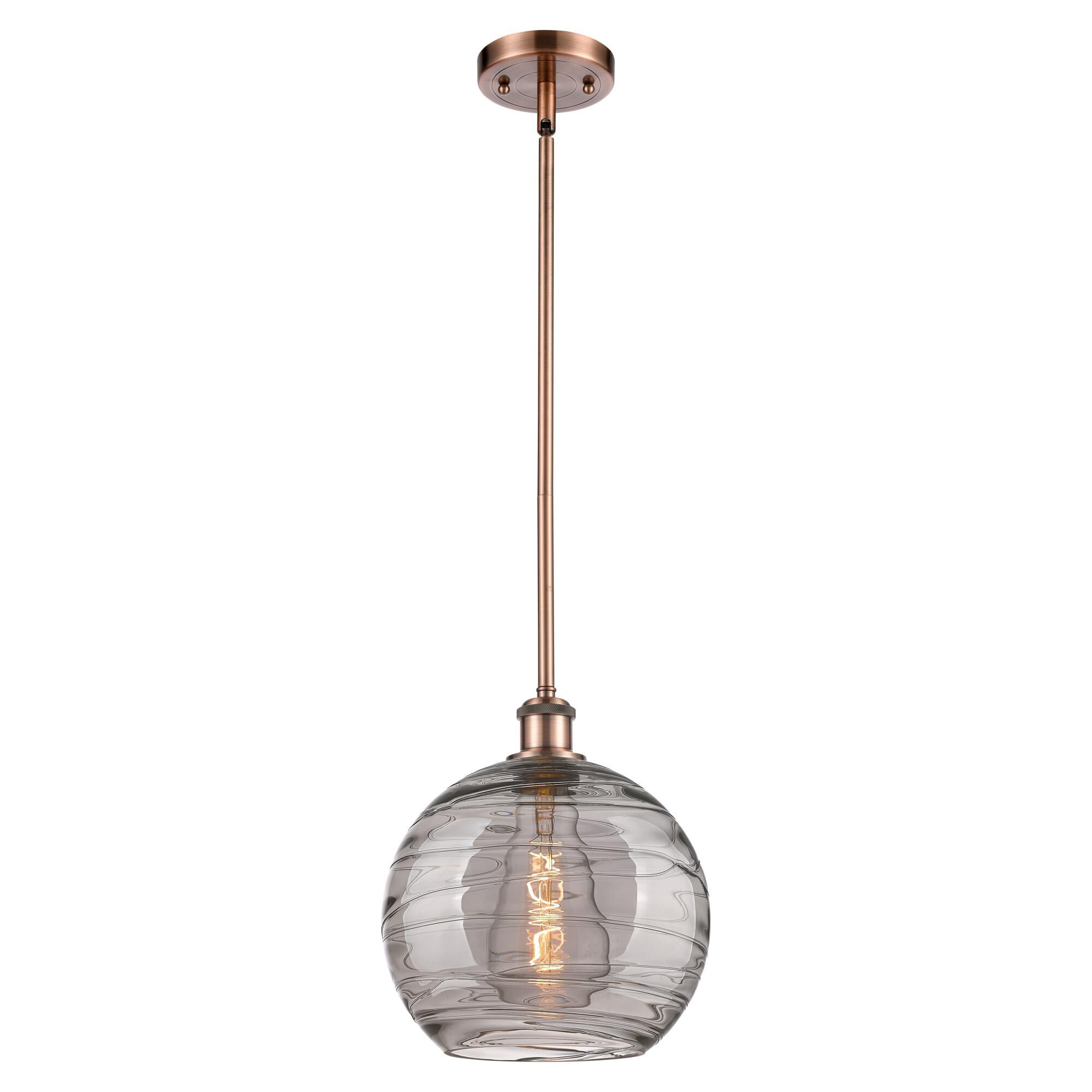 Shown in Antique Copper finish and Light Smoke Deco Swirl glass