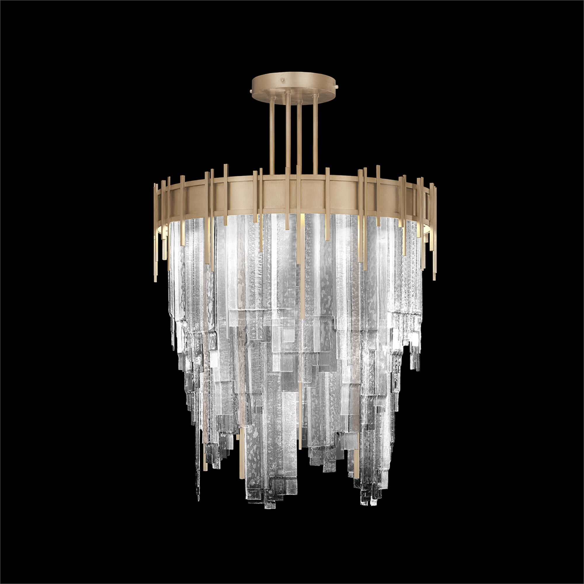 Shown in Gold finish and Clear glass