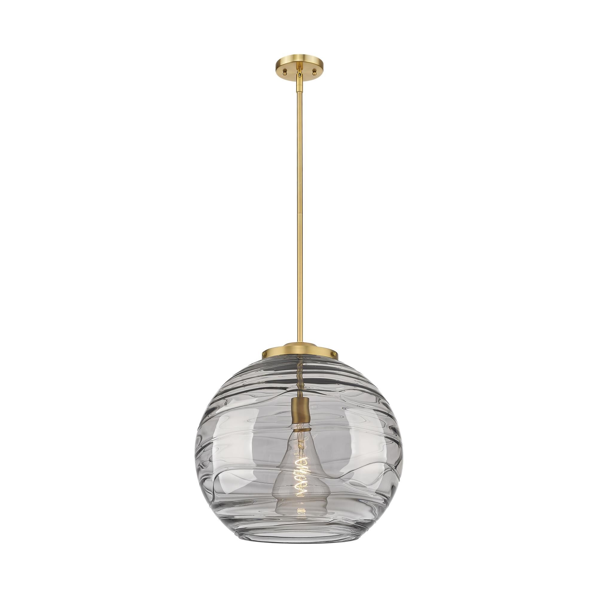 Shown in Brushed Brass finish and Light Smoke Deco Swirl glass