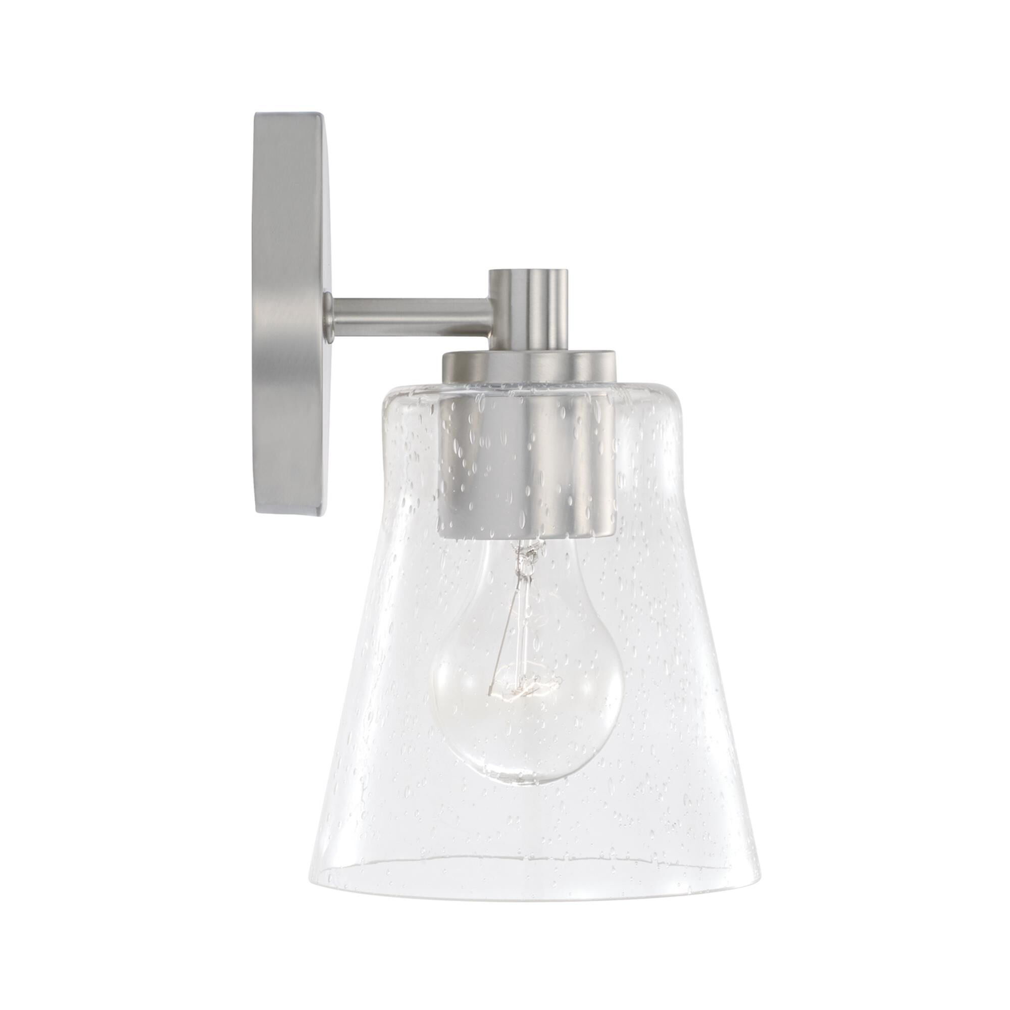 Shown in Brushed Nickel finish and Clear Seeded glass