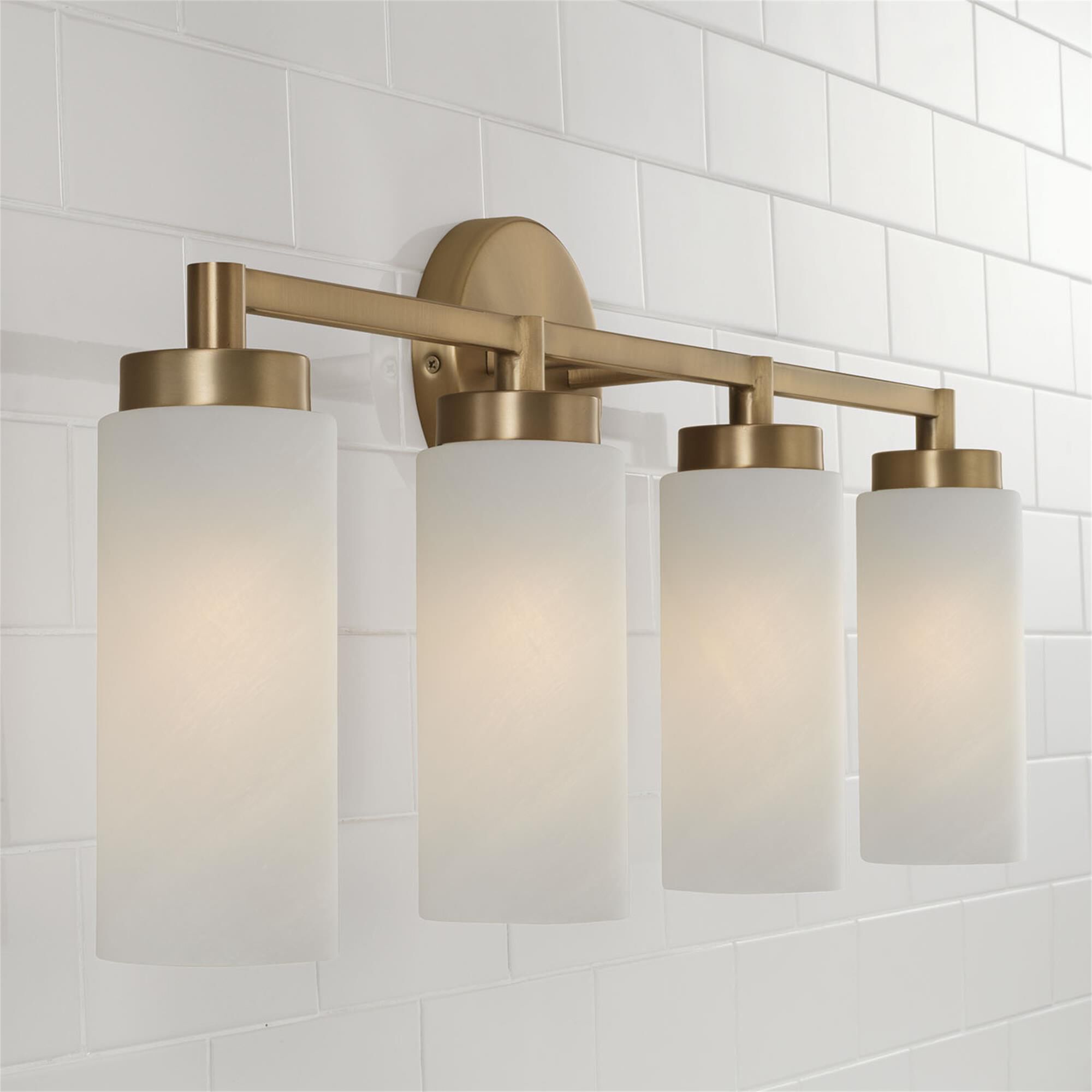 Shown in Aged Brass finish and Faux Alabaster glass