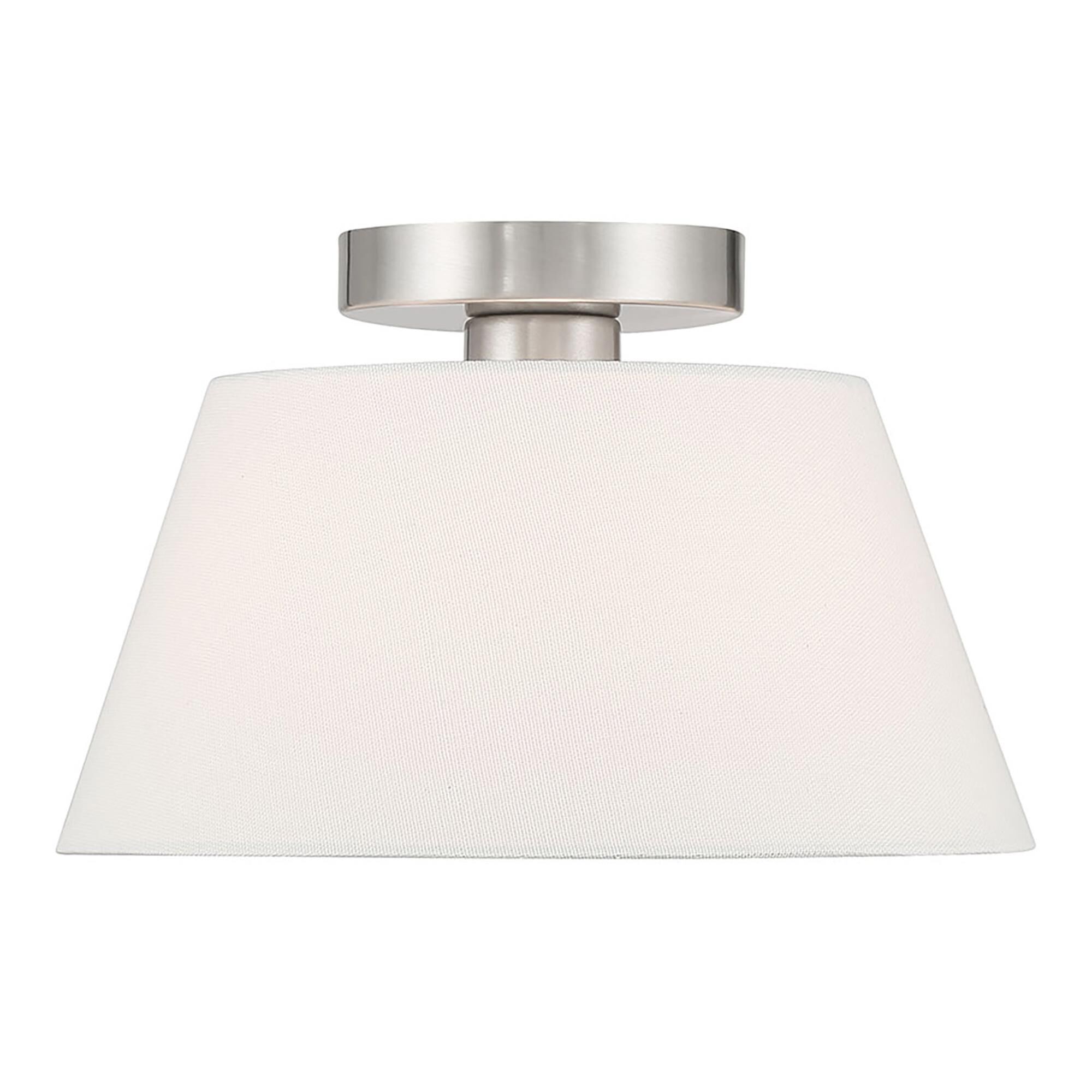 Shown in Brushed Nickel finish and White Linen Fabric shade