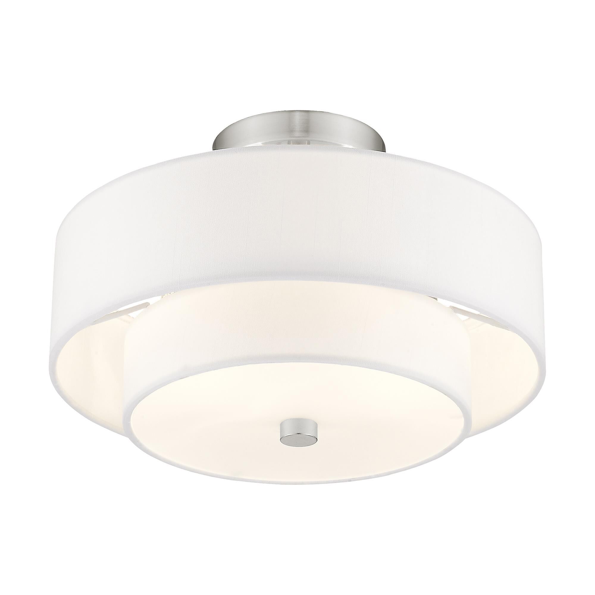 Shown in Brushed Nickel finish and Hand Crafted Off-White Fabric Hardback shade