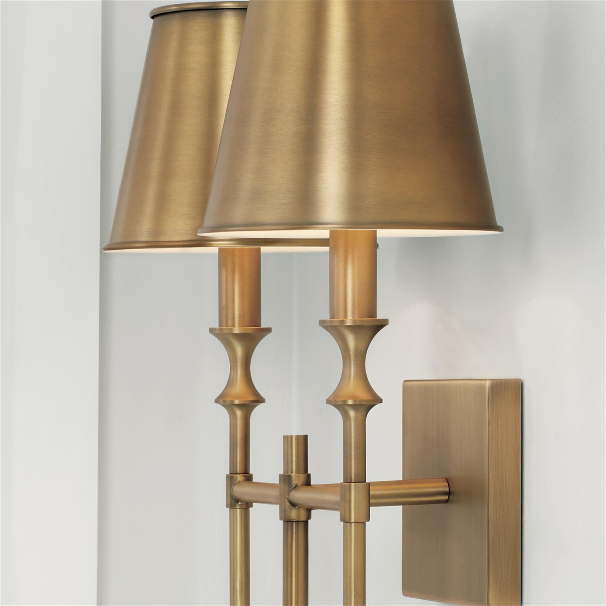 Shown in Aged Brass finish and Aged Brass Metal Stay-Straight  with White Interior shade