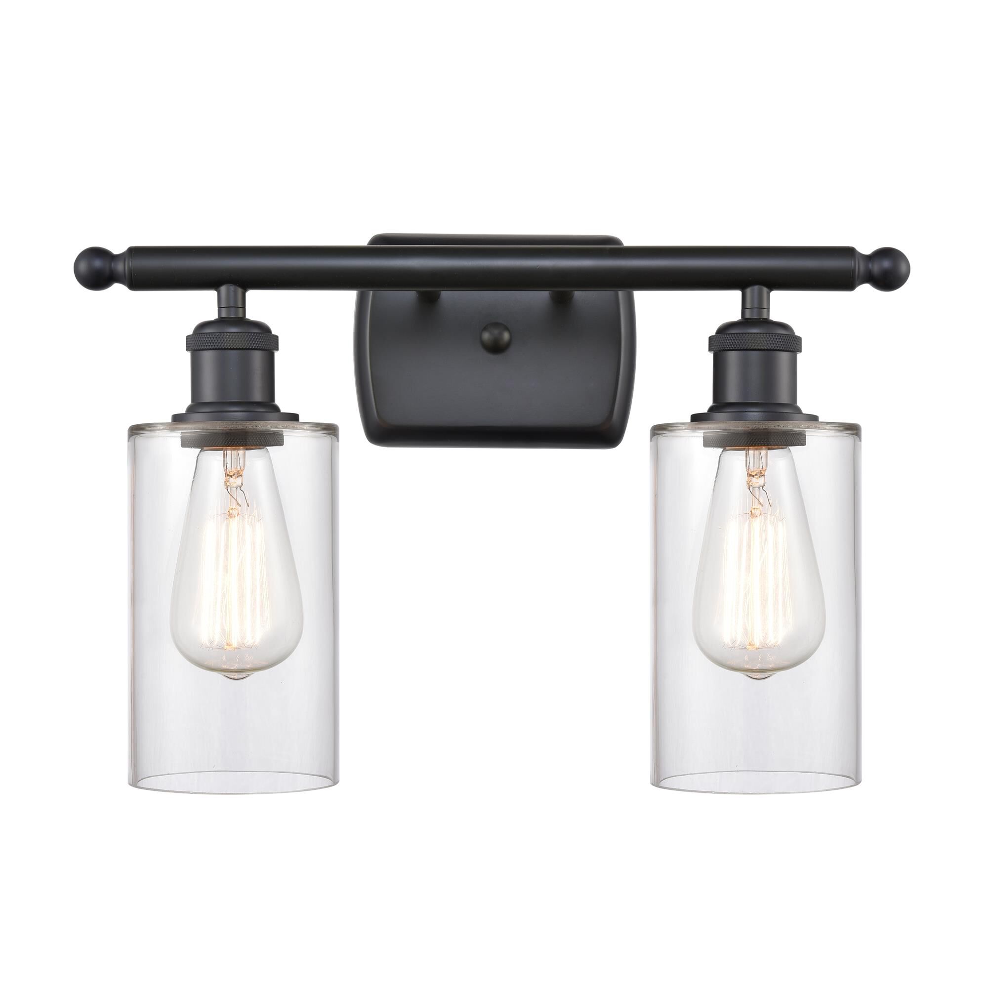 Shown in Matte Black finish and Drum glass and Glass shade and Polished Chrome accent