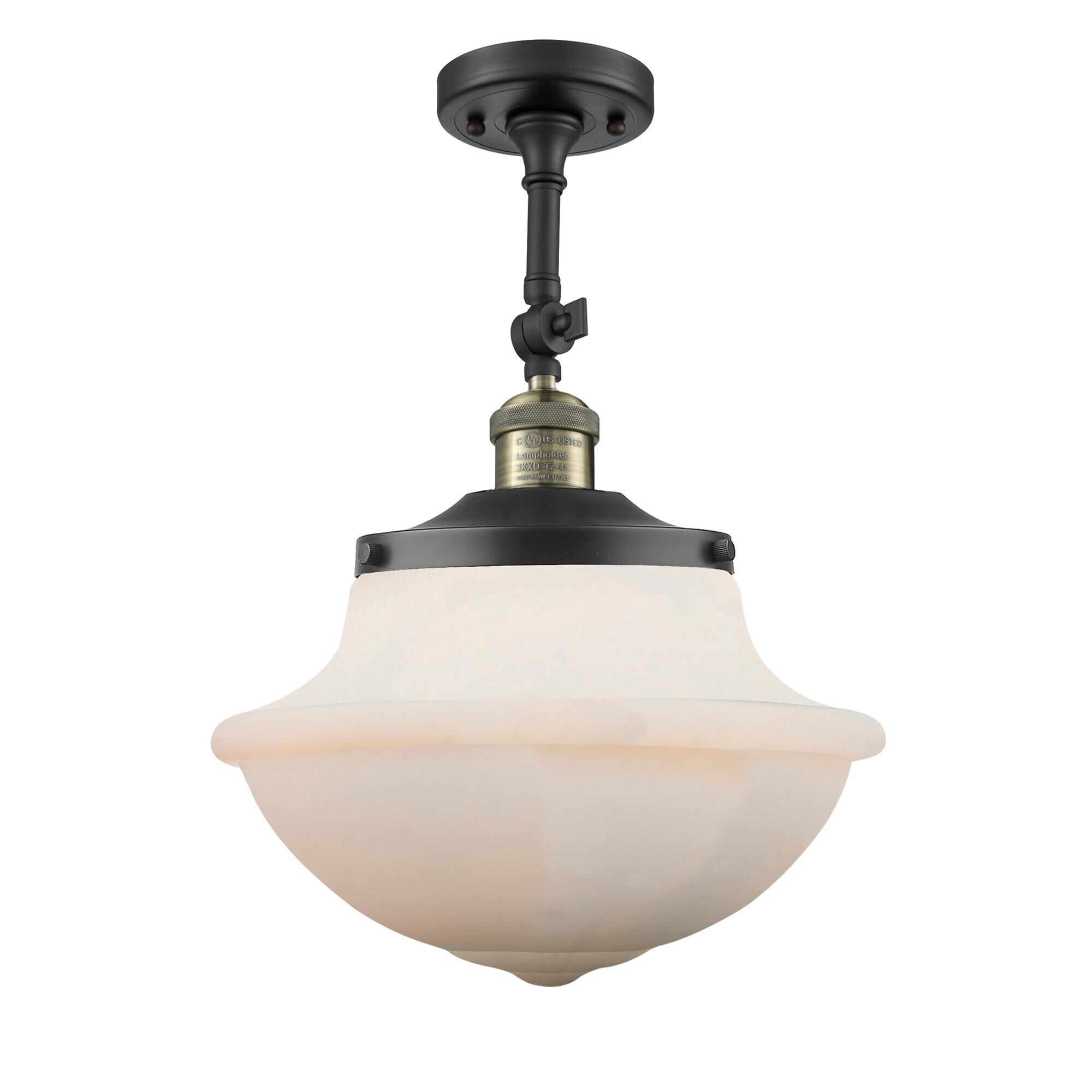 Shown in Black Antique Brass finish and Matte White glass