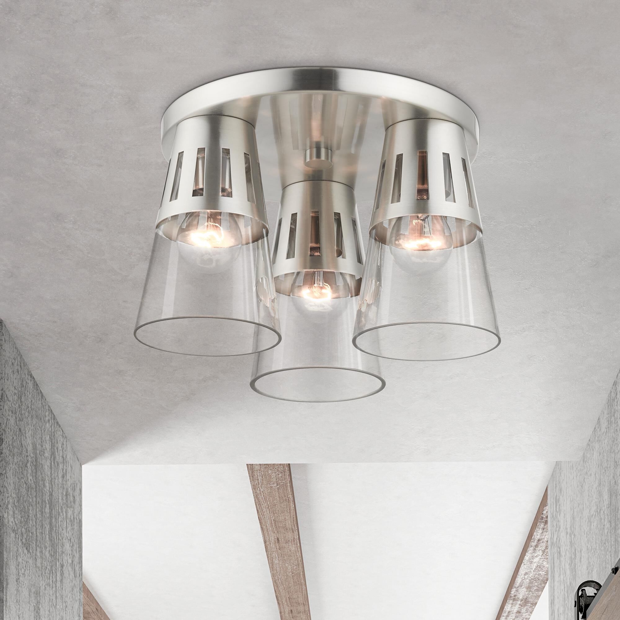 Shown in Brushed Nickel finish and Clear Hand Blown glass