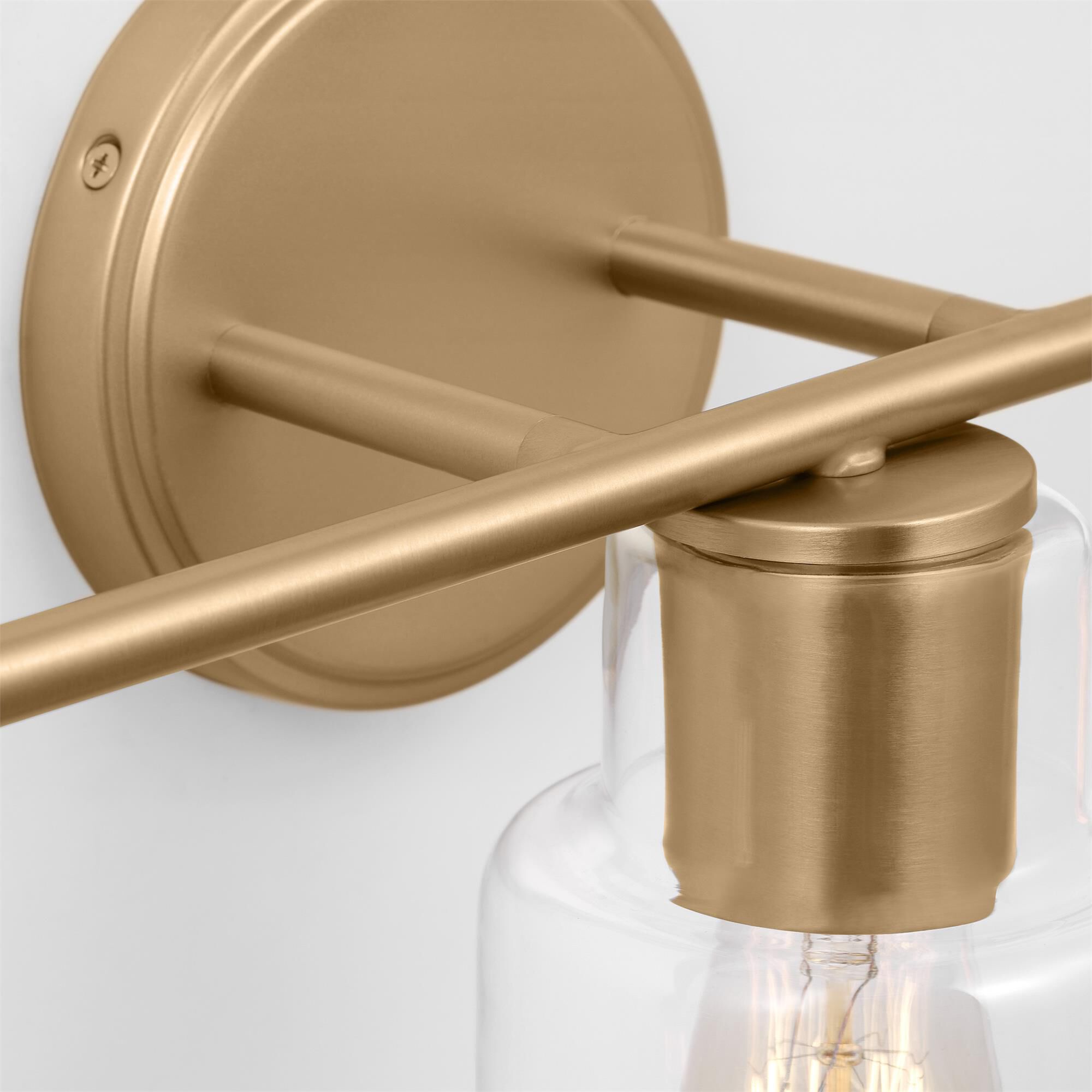 Shown in Satin Brass finish and Clear Glass s shade