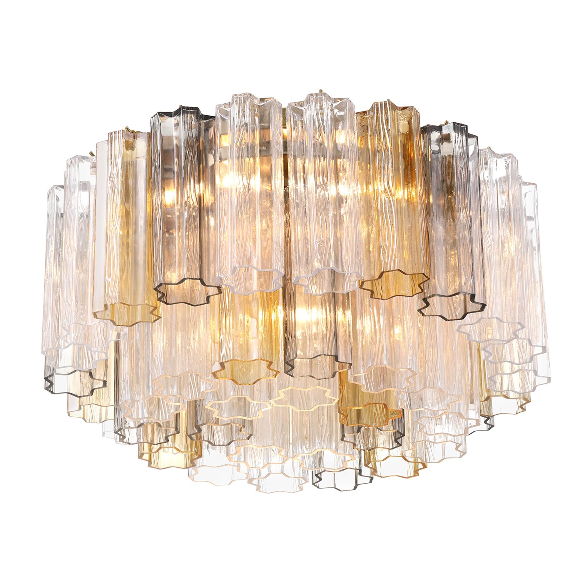 Shown in Aged Brass finish and Tronchi Autumn glass