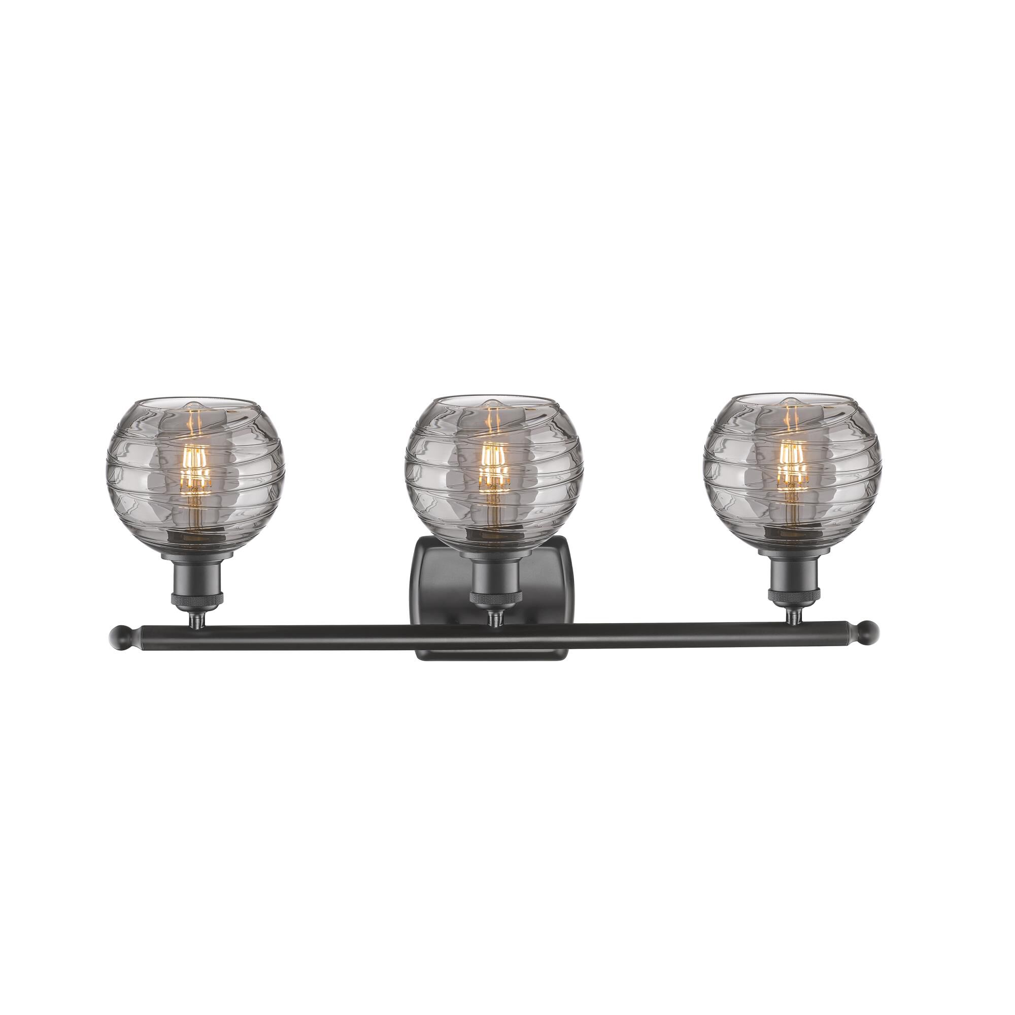 Shown in Oil Rubbed Bronze finish and Light Smoke Deco Swirl glass