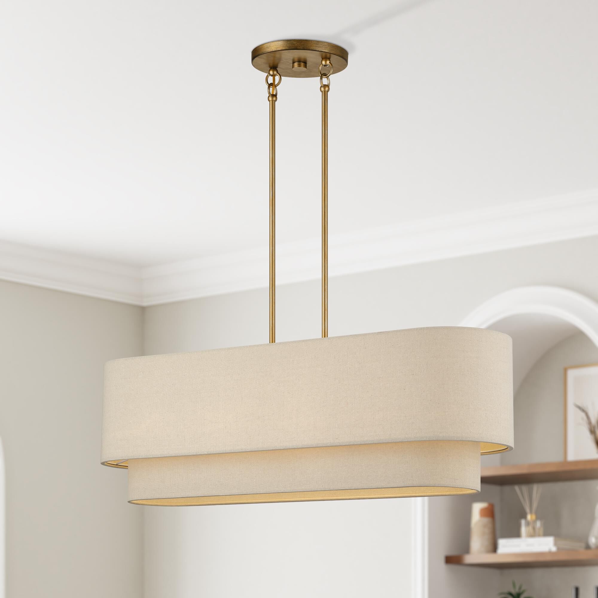 Shown in Antique Gold Leaf finish and Hand Crafted Parchment Color Hardback Fabric shade