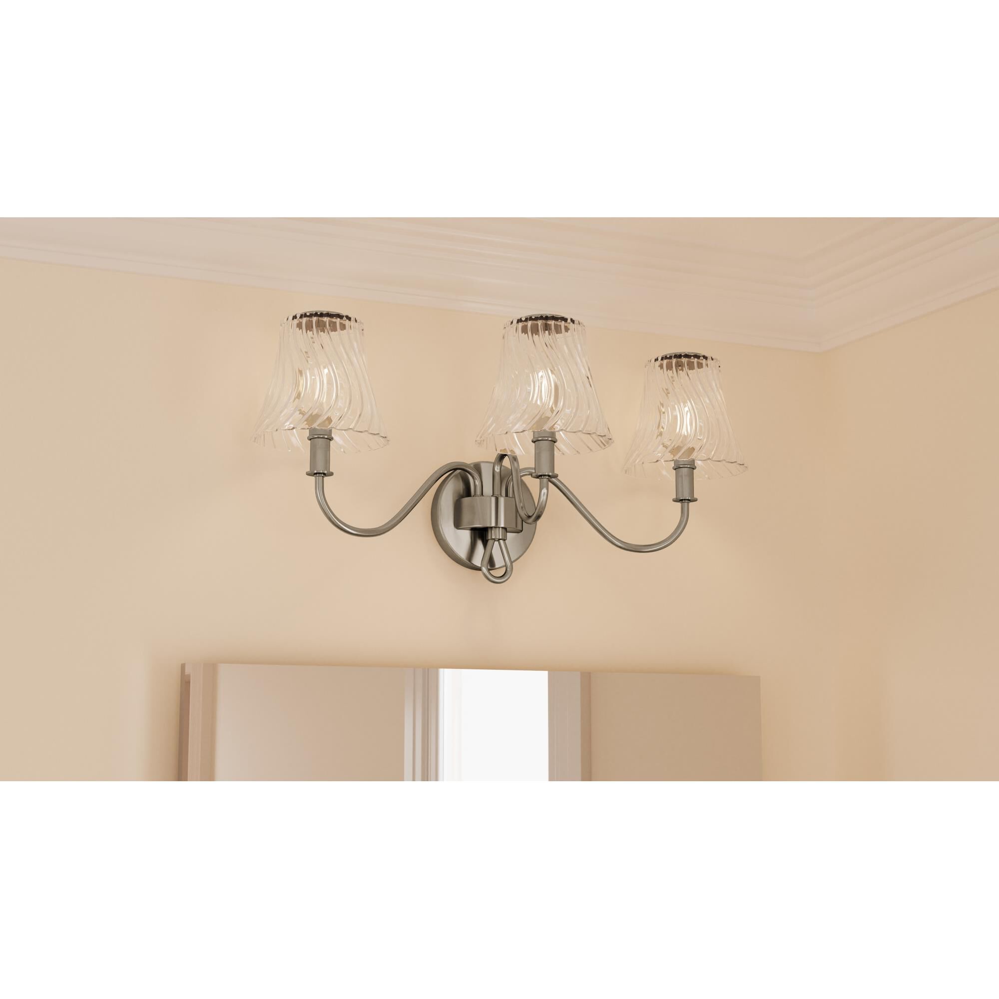 Shown in Brushed Nickel finish and Clear Swirl glass