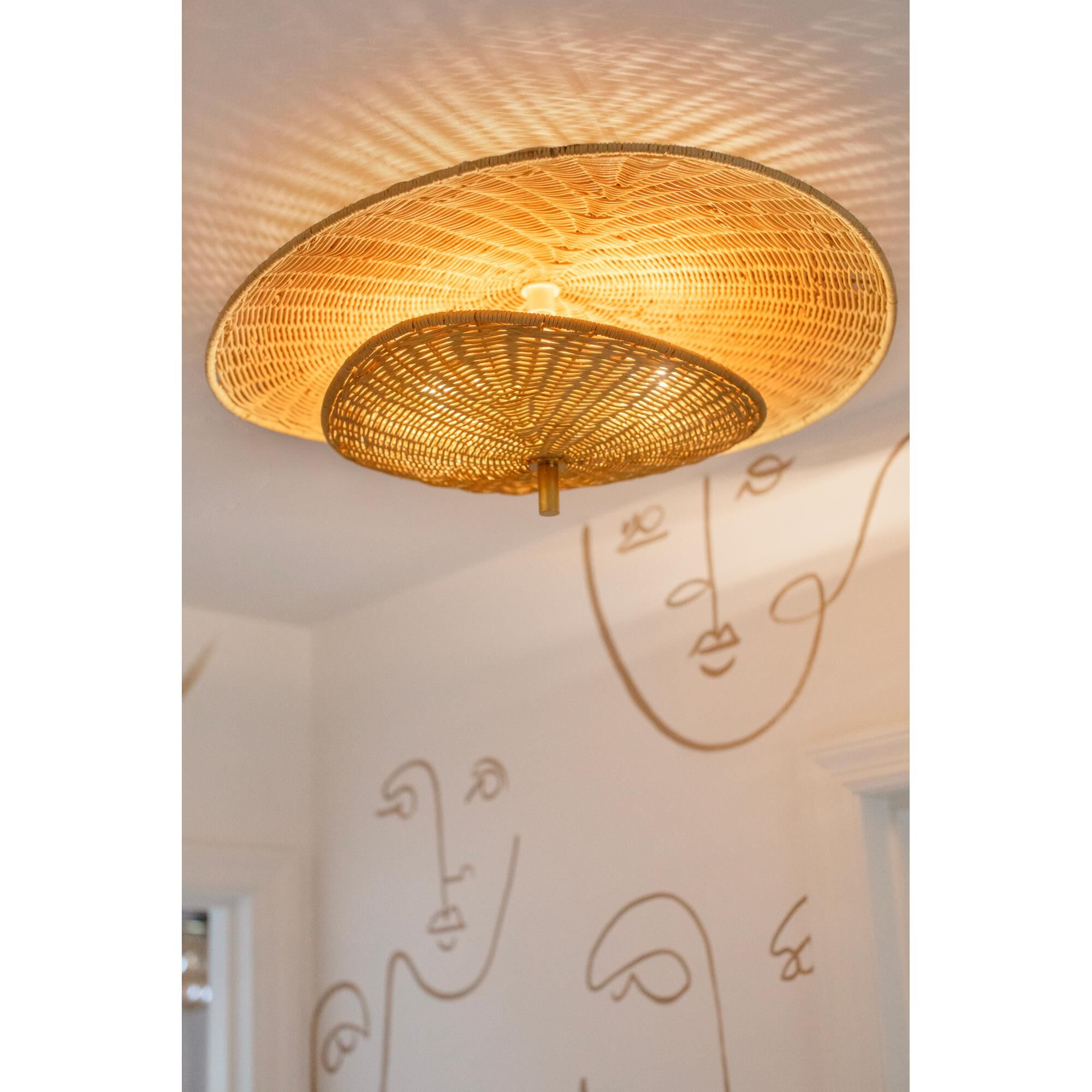 Shown in Aged Brass finish and Natural Woven shade