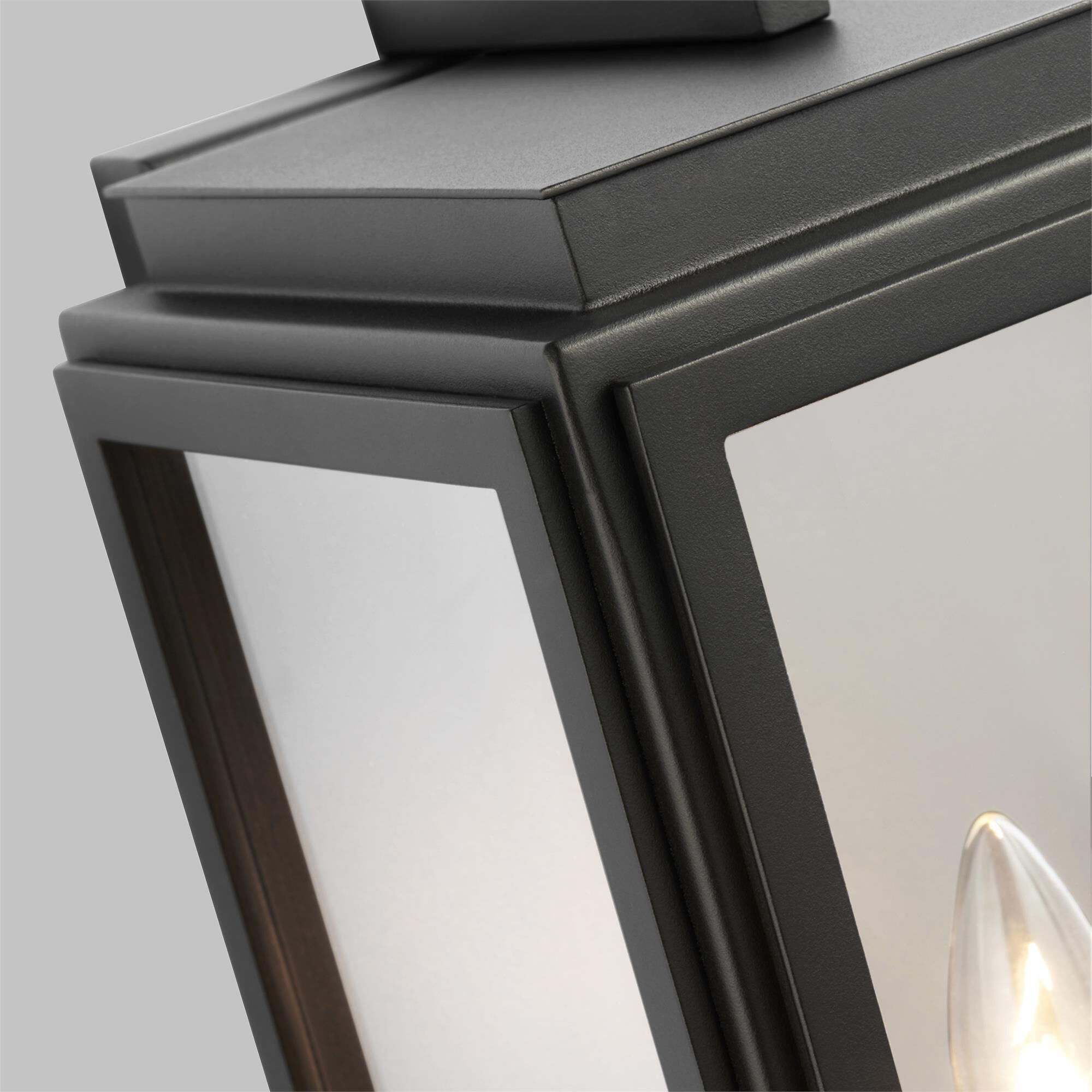 Shown in Textured Black finish and Clear Glass Panels shade