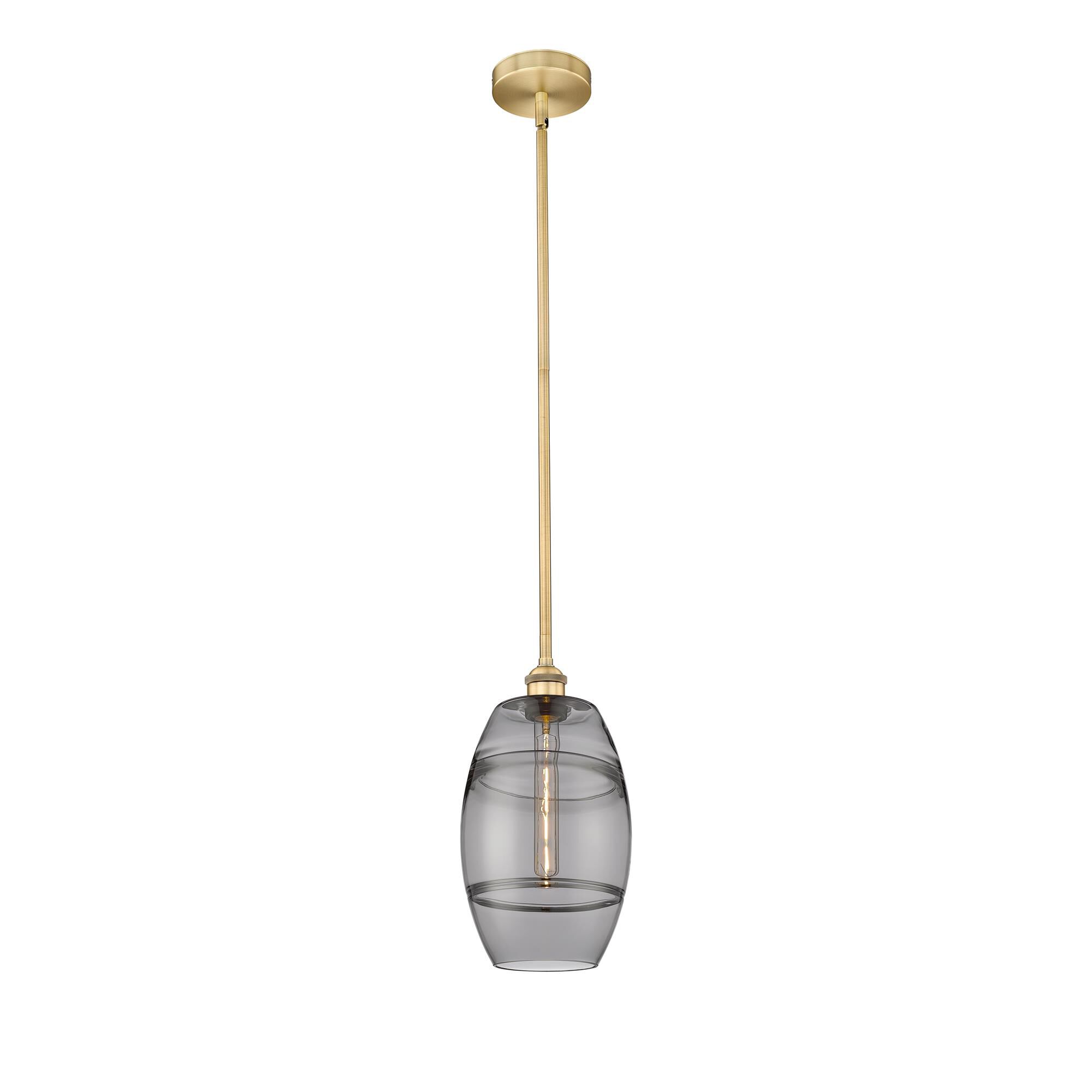 Shown in Brushed Brass finish and Light Smoke glass