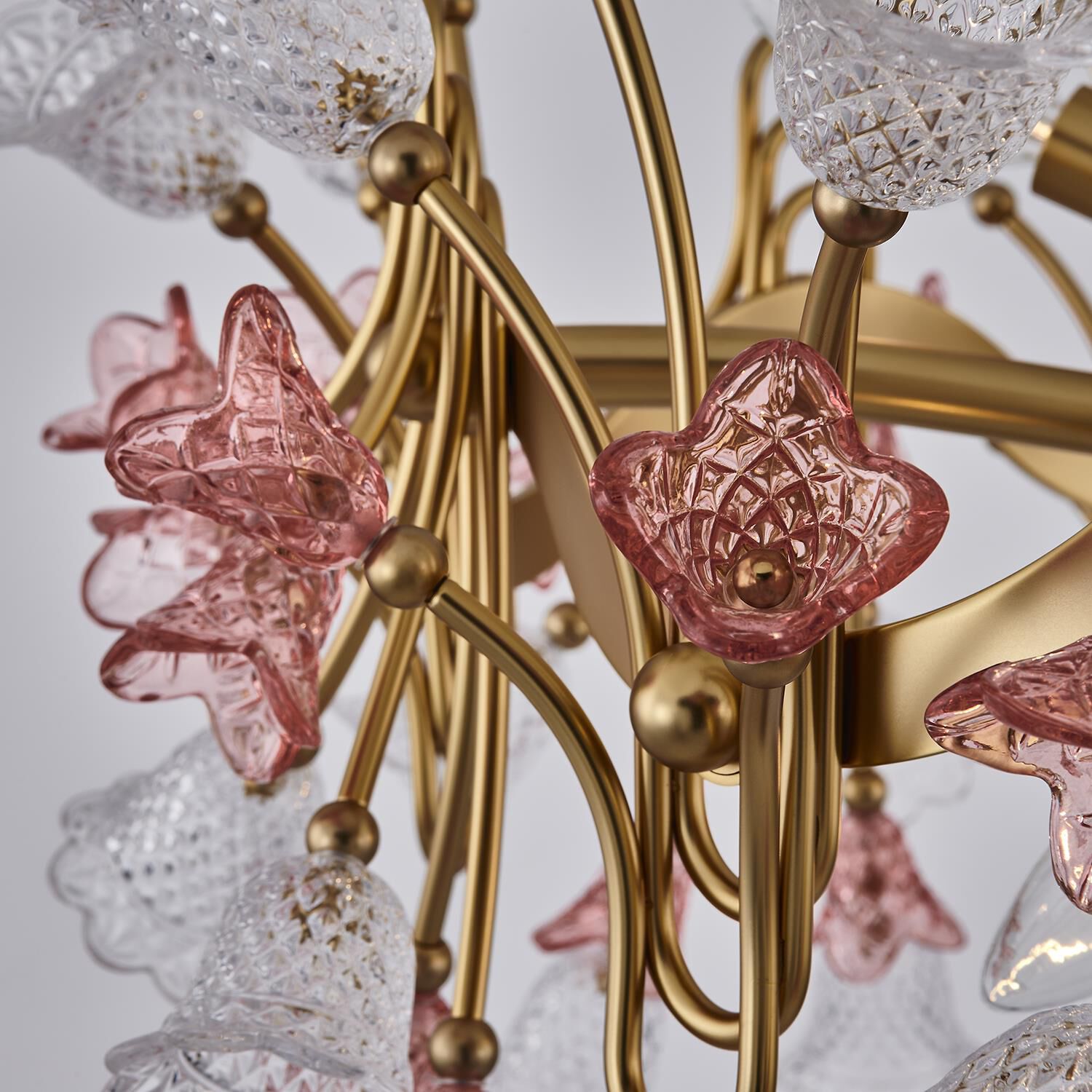 Shown in Antique Brass finish and Vintage Rose crystal