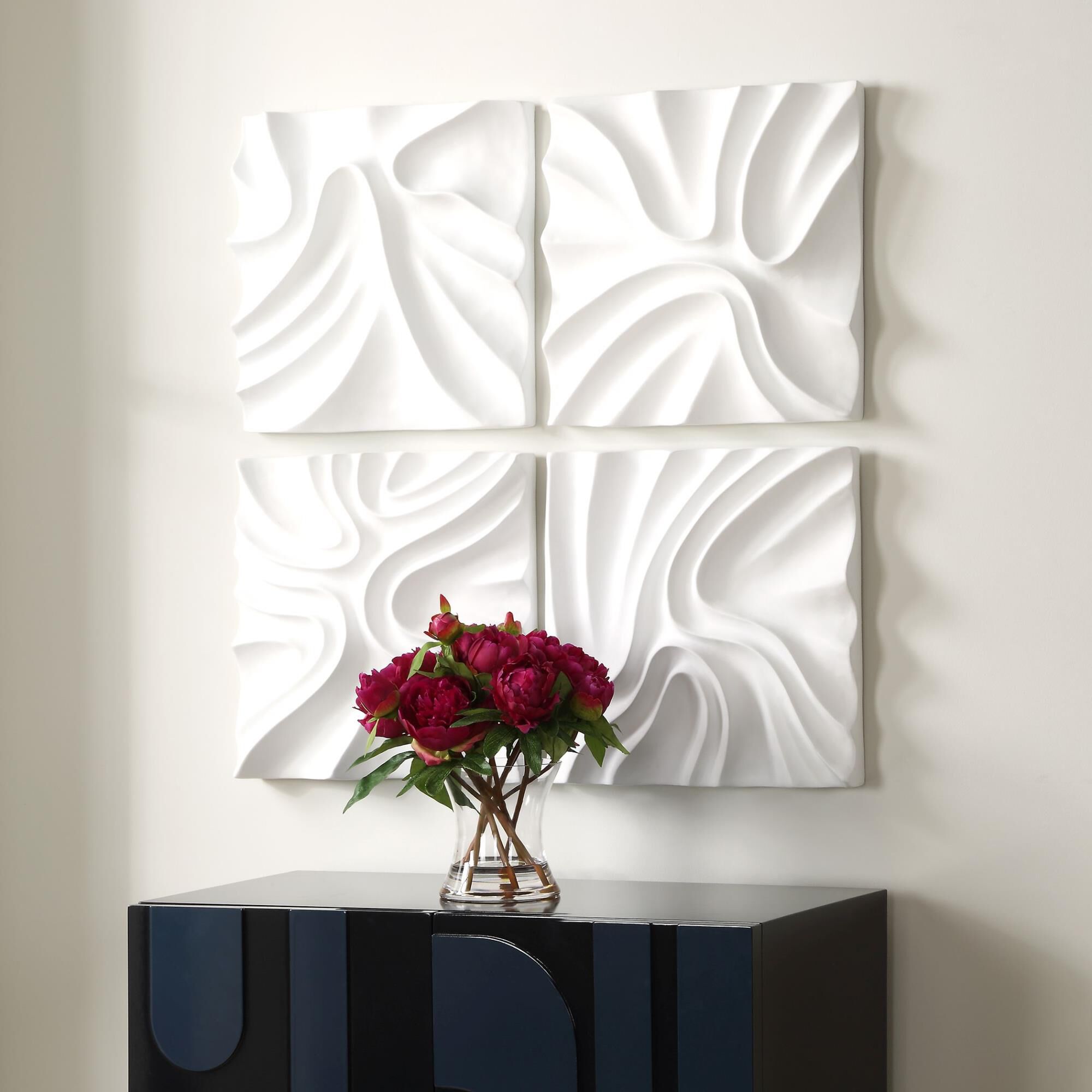 Shown in Three Dimensional Sculptural Wall Panels Crafted In Resin In Fresh White, Resembling Billowing Snow  finish