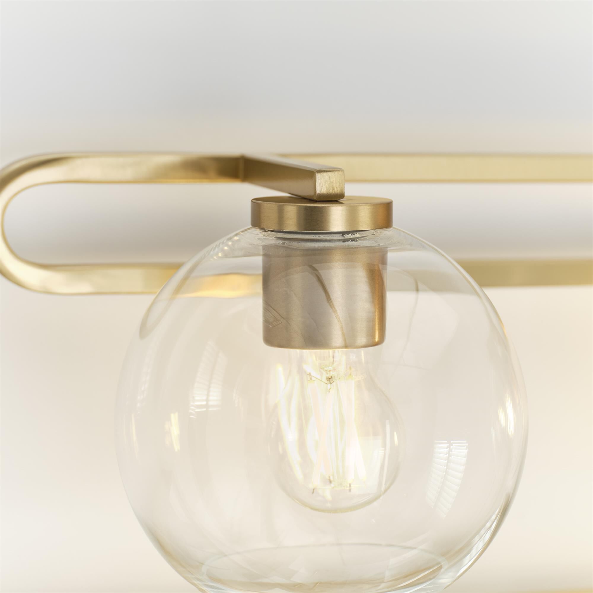 Shown in Satin Brass finish and Clear glass
