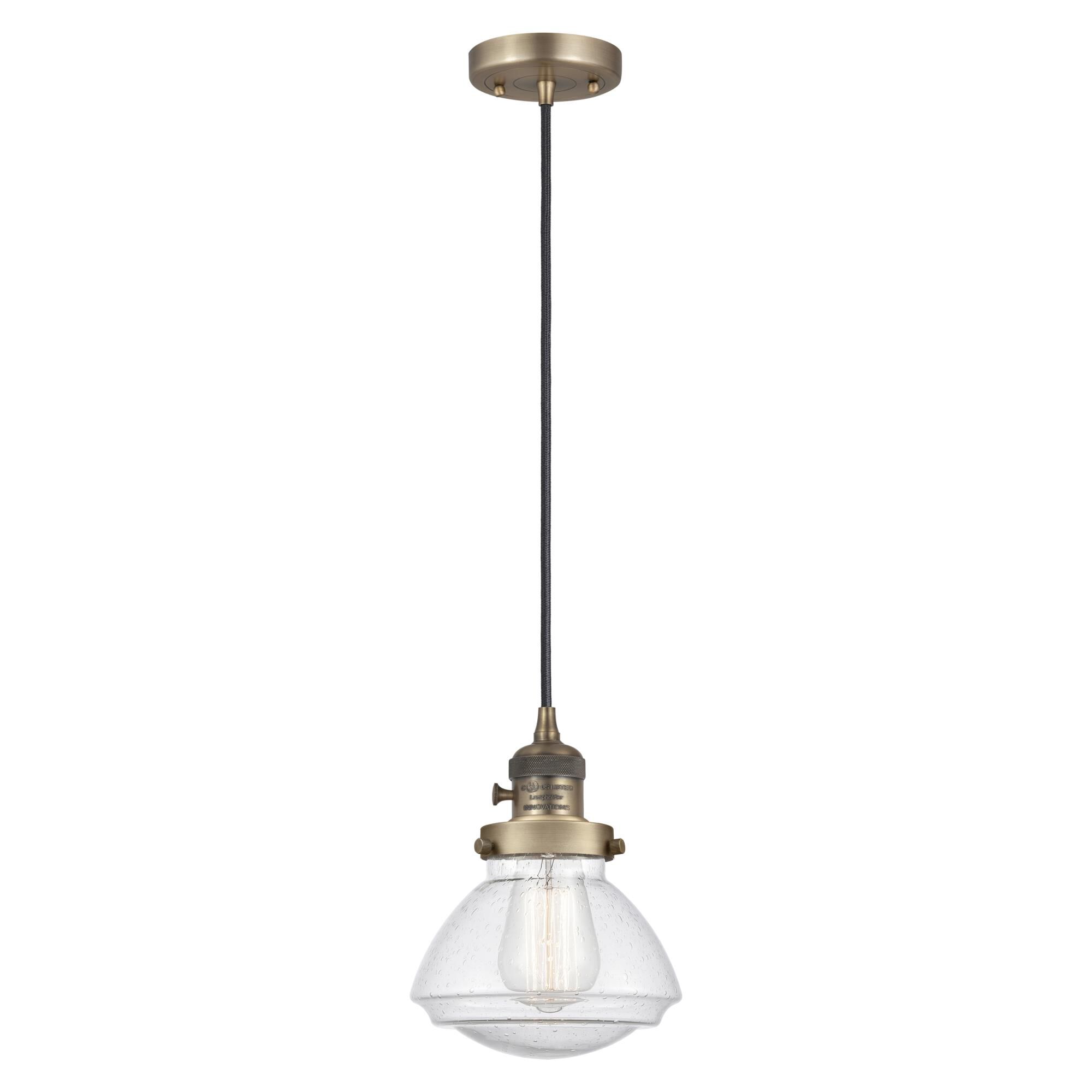 Shown in Brushed Brass finish and Seedy glass