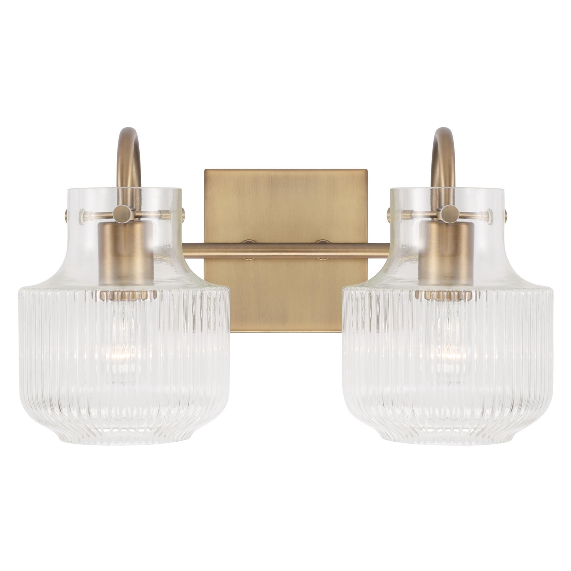 Shown in Aged Brass finish and Clear Fluted glass