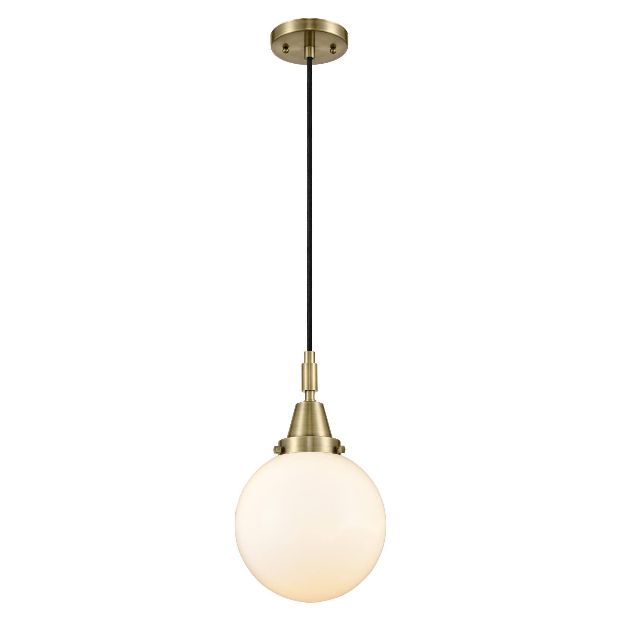 Shown in Antique Brass finish and Matte White glass