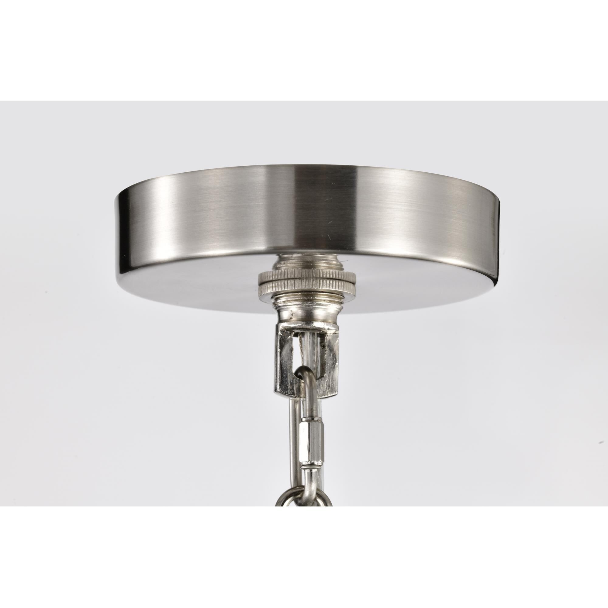 Shown in Brushed Nickel finish and Clear Seeded glass