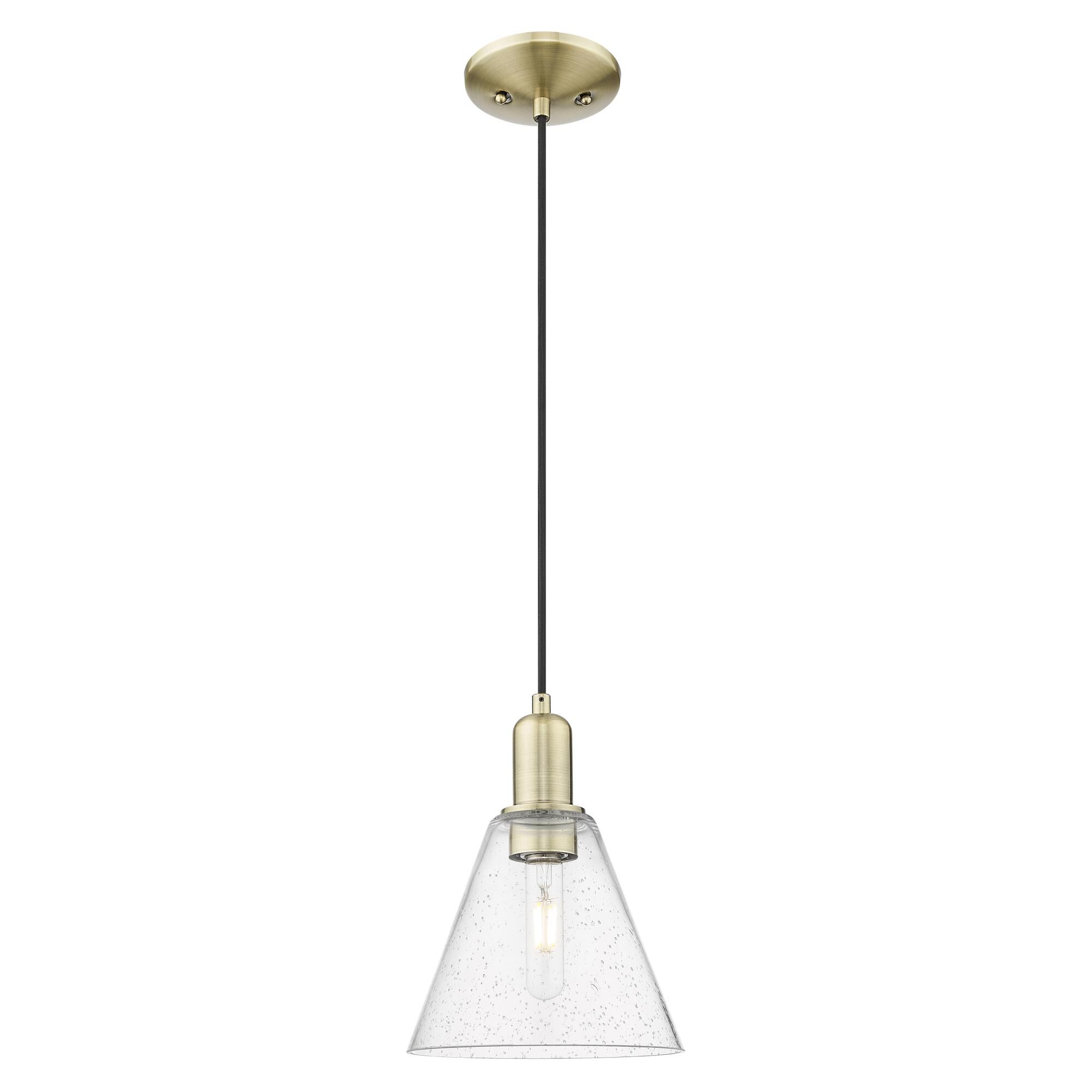 Shown in Antique Brass finish and Seedy glass