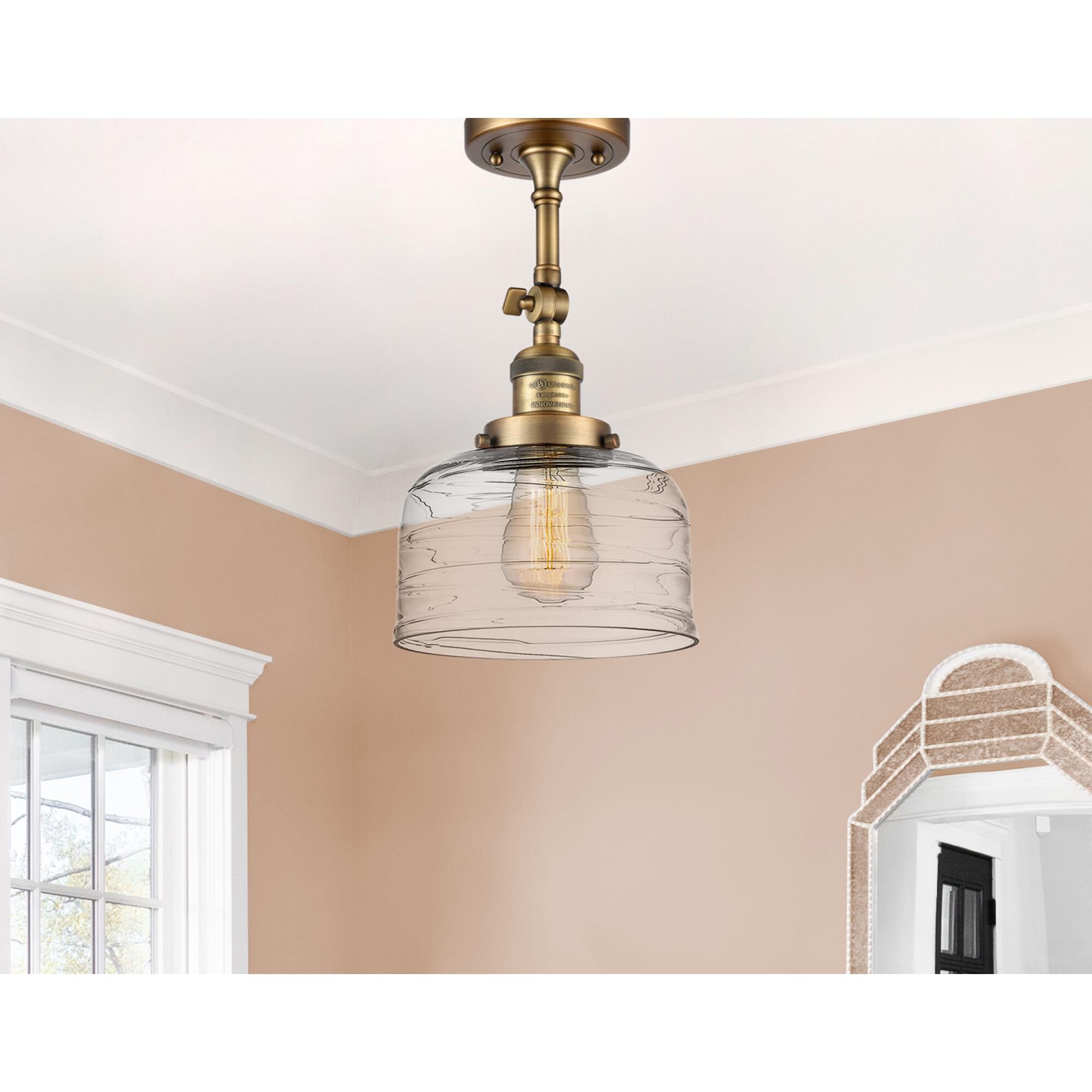 Shown in Brushed Brass finish and Clear glass