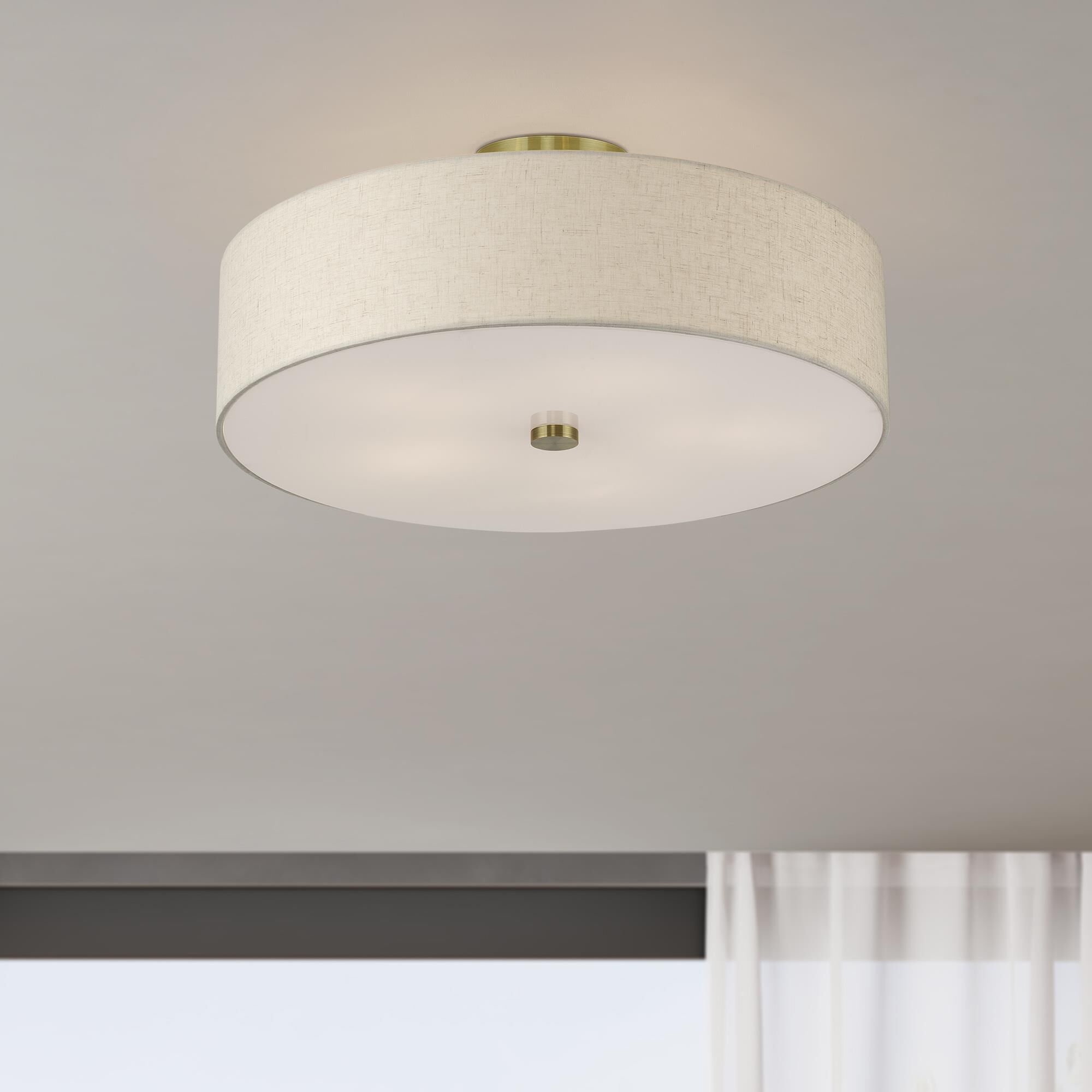 Shown in Antique Brass finish and Hand Crafted Oatmeal Color Fabric with White Color Inside shade