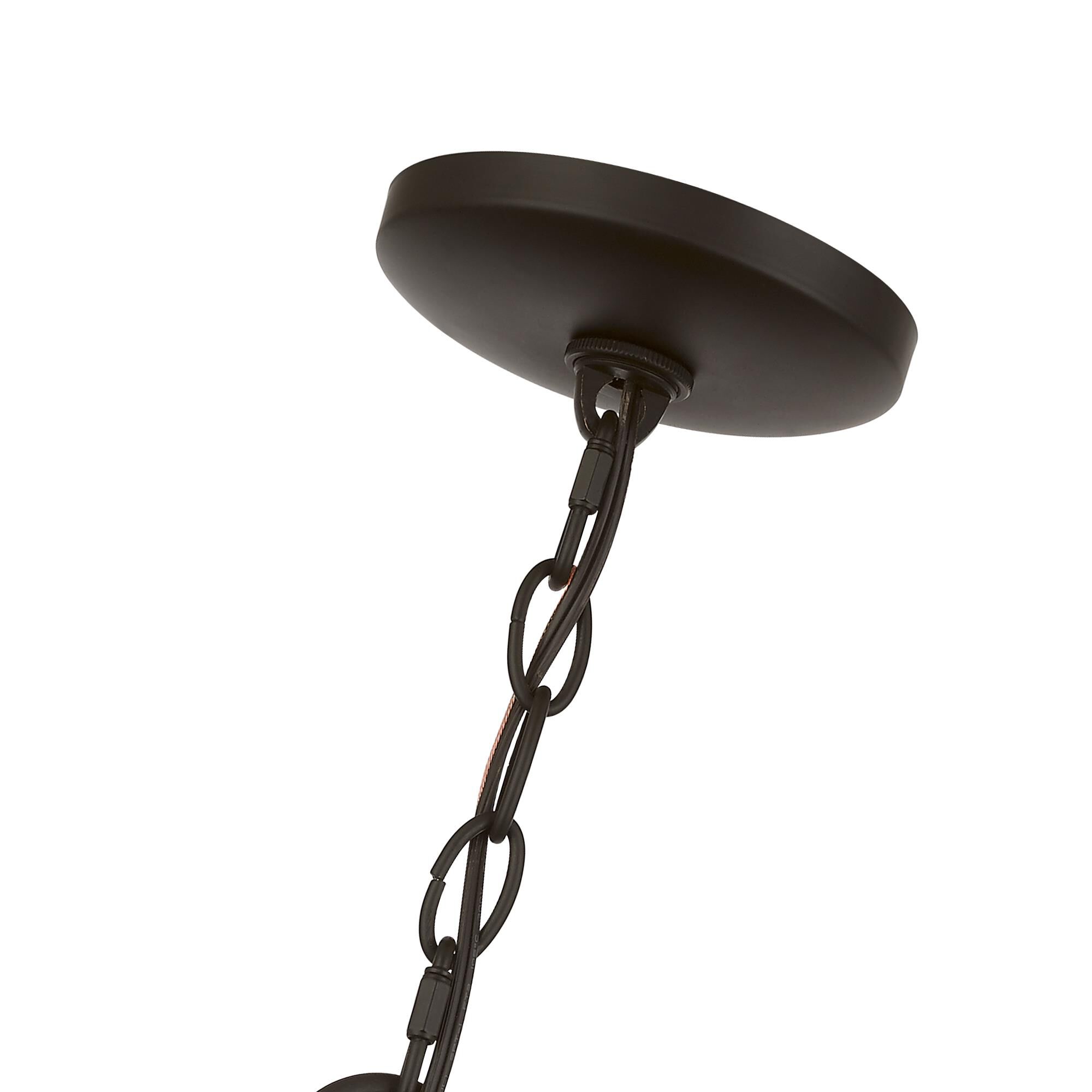 Shown in Bronze with Antique Brass Finish Cluster finish and Clear glass