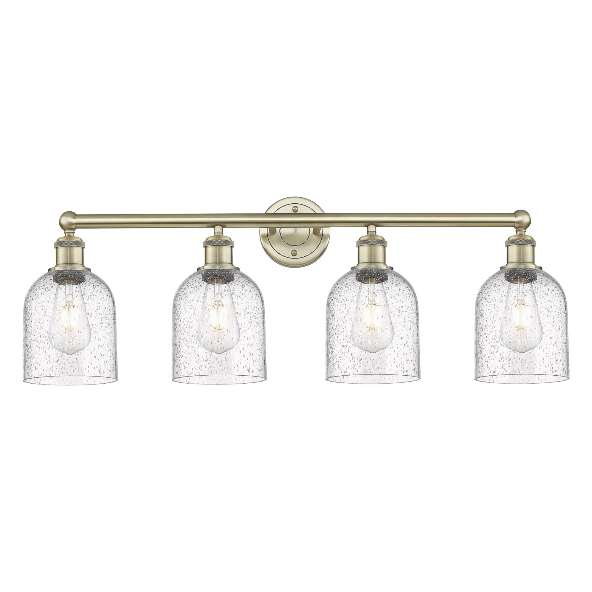 Shown in Antique Brass finish and Seedy glass