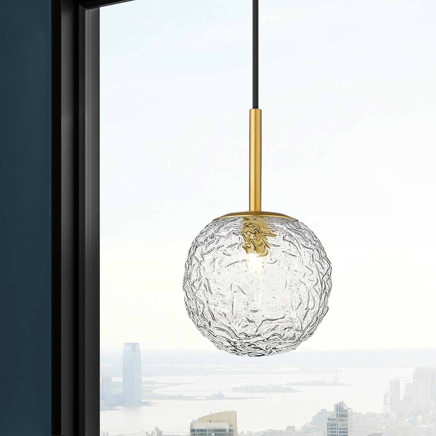 Shown in Brushed Brass finish and Clear shade