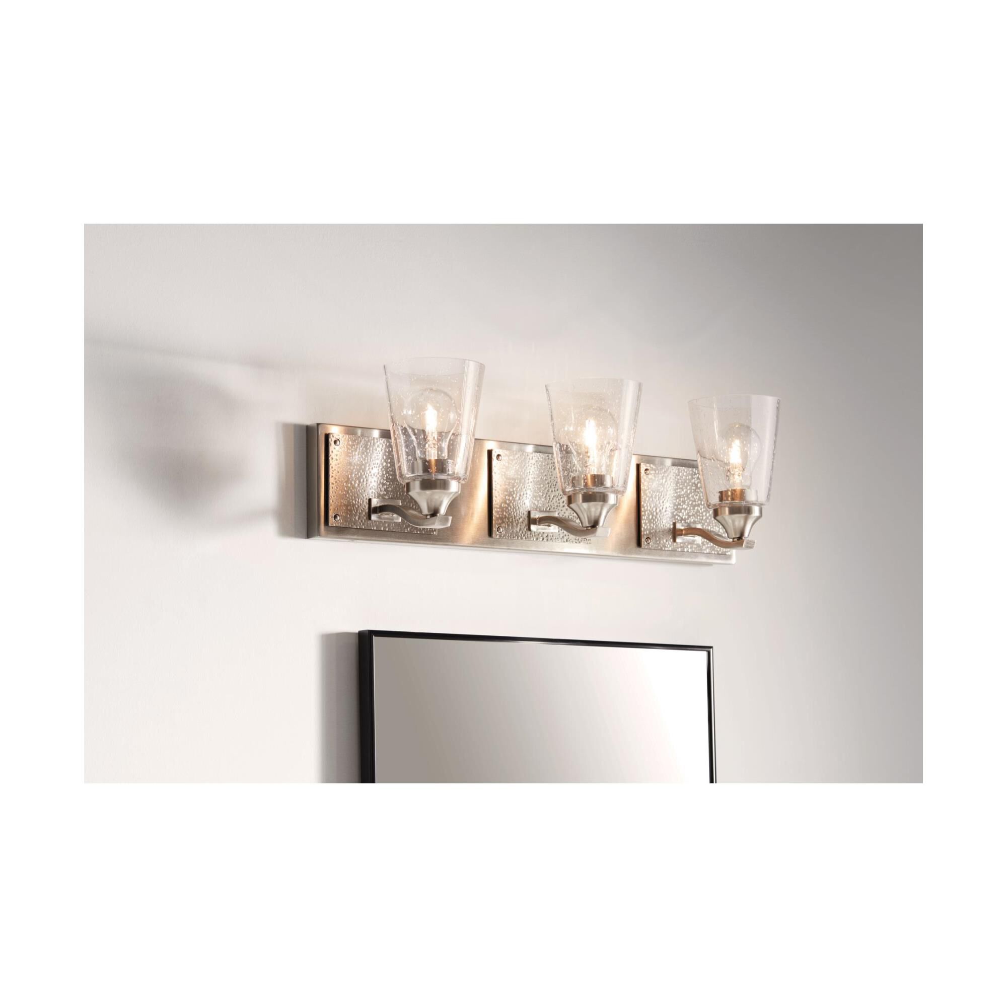 Shown in Brushed Nickel finish and Clear Seedy glass