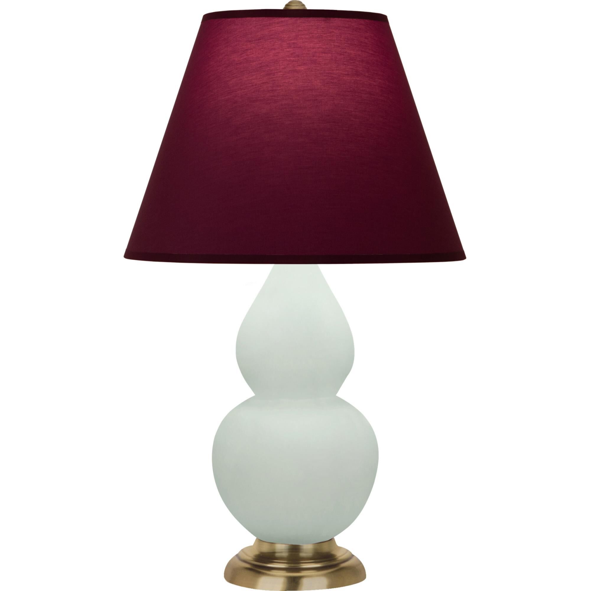 Shown in Matte Celadon finish and Plum and Lavender shade and Antique Natural Brass accent