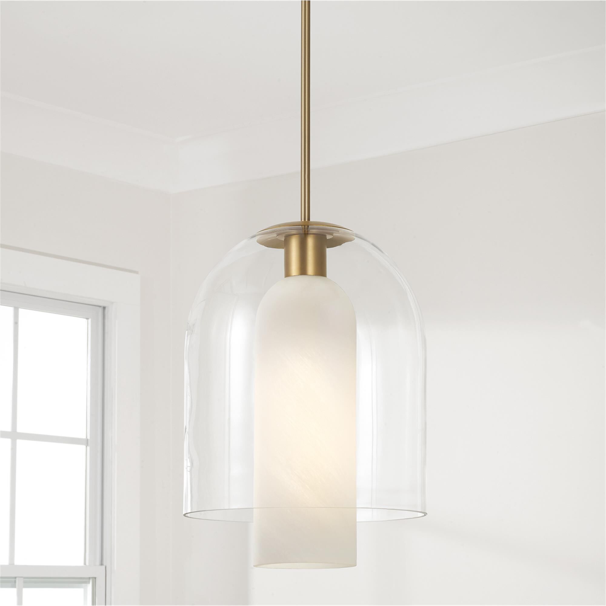 Shown in Aged Brass finish and Clear And Faux Alabaster glass