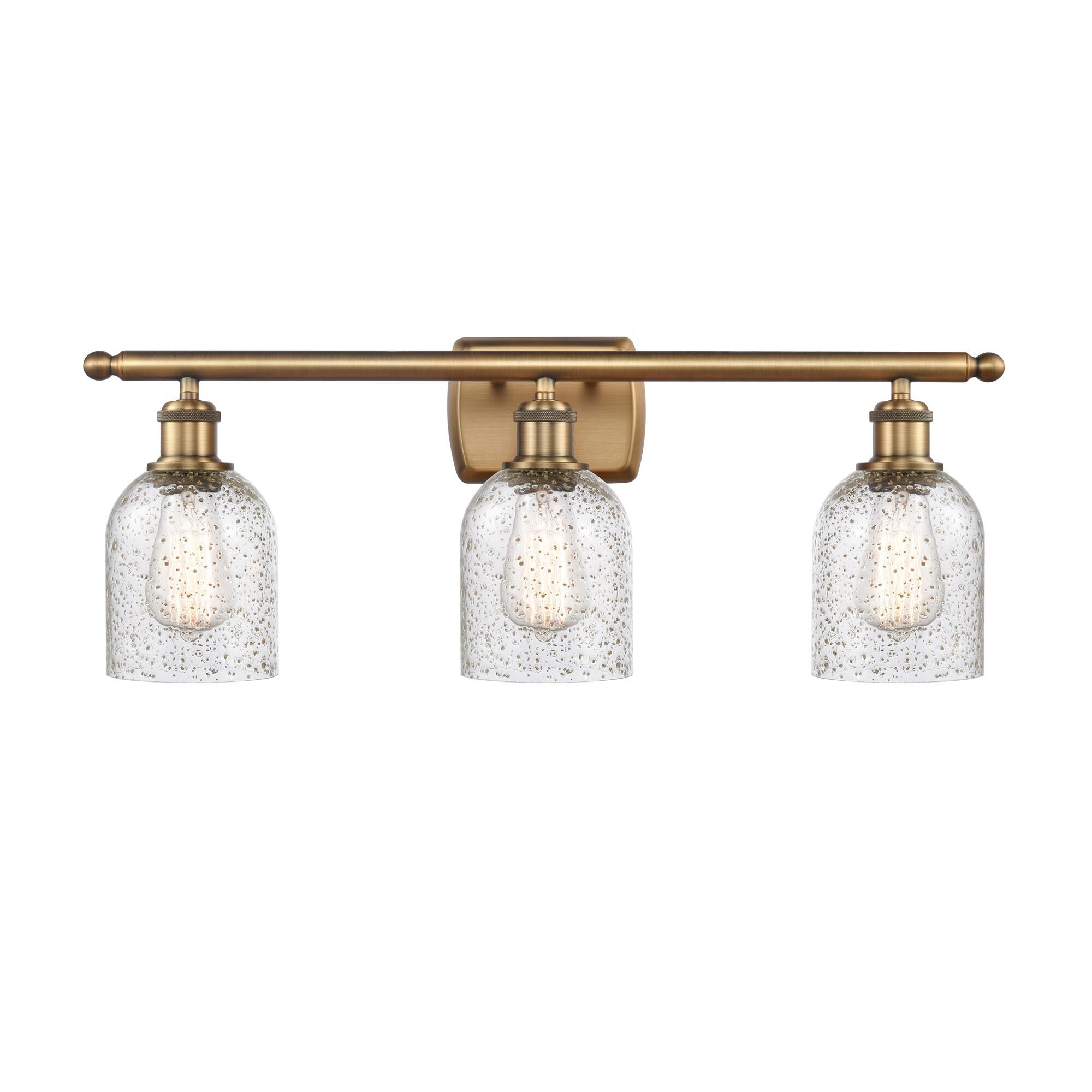 Shown in Brushed Brass finish and Bell glass and Glass shade