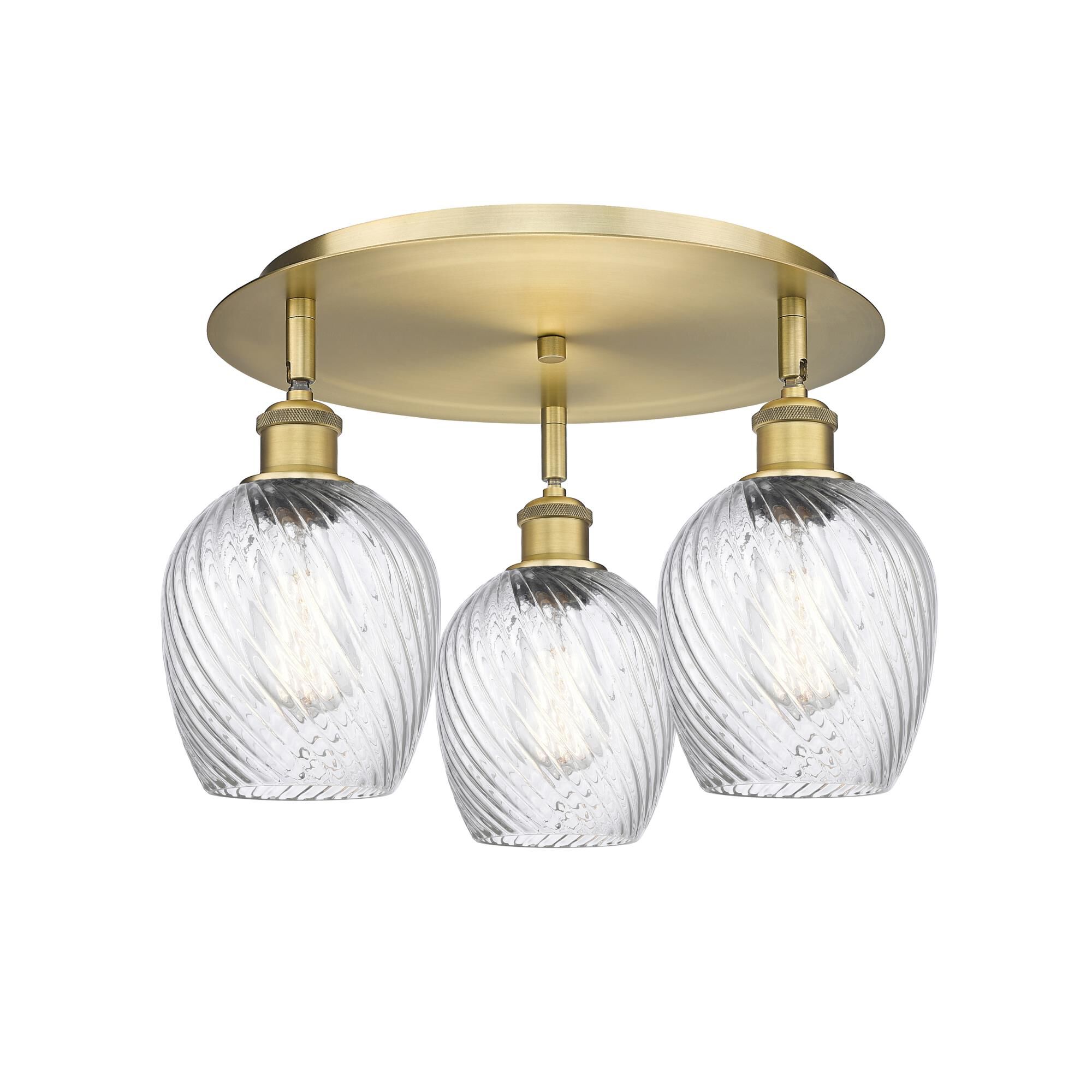 Shown in Brushed Brass finish and Clear Spiral Fluted glass