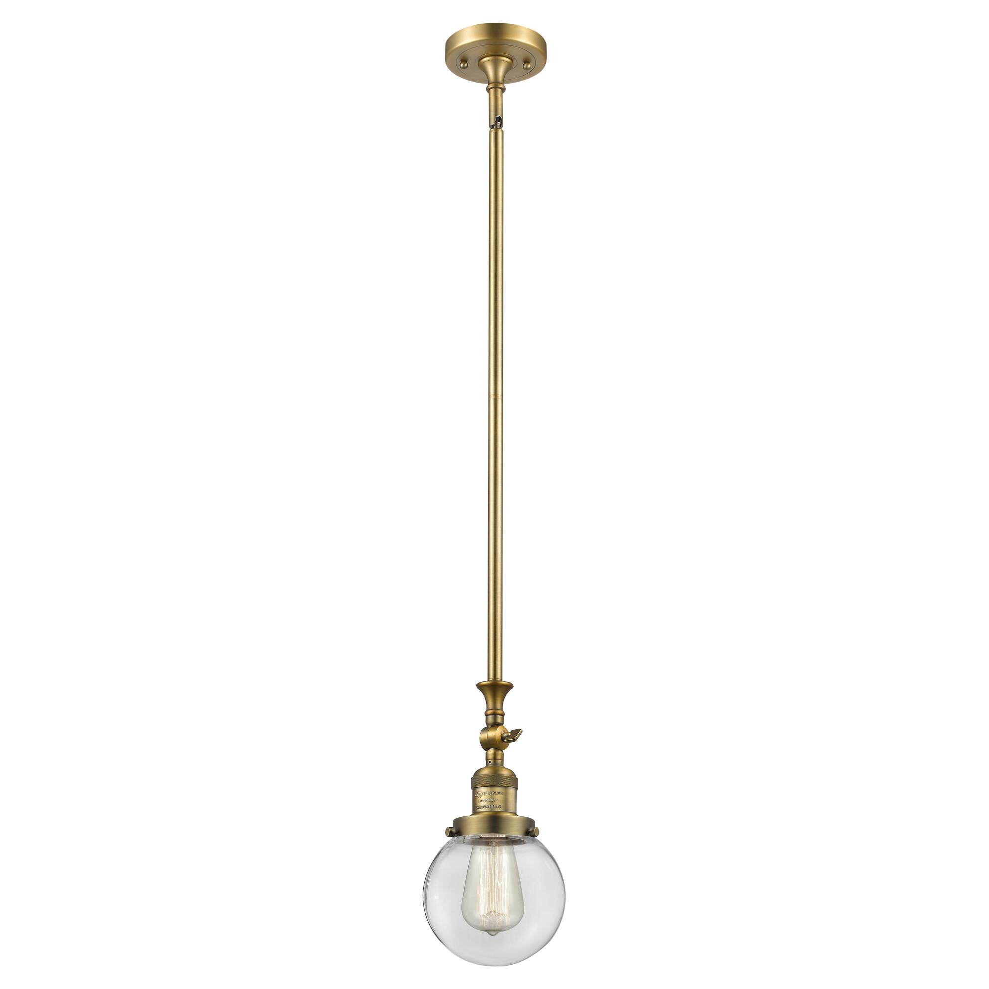 Shown in Brushed Brass finish and Clear glass