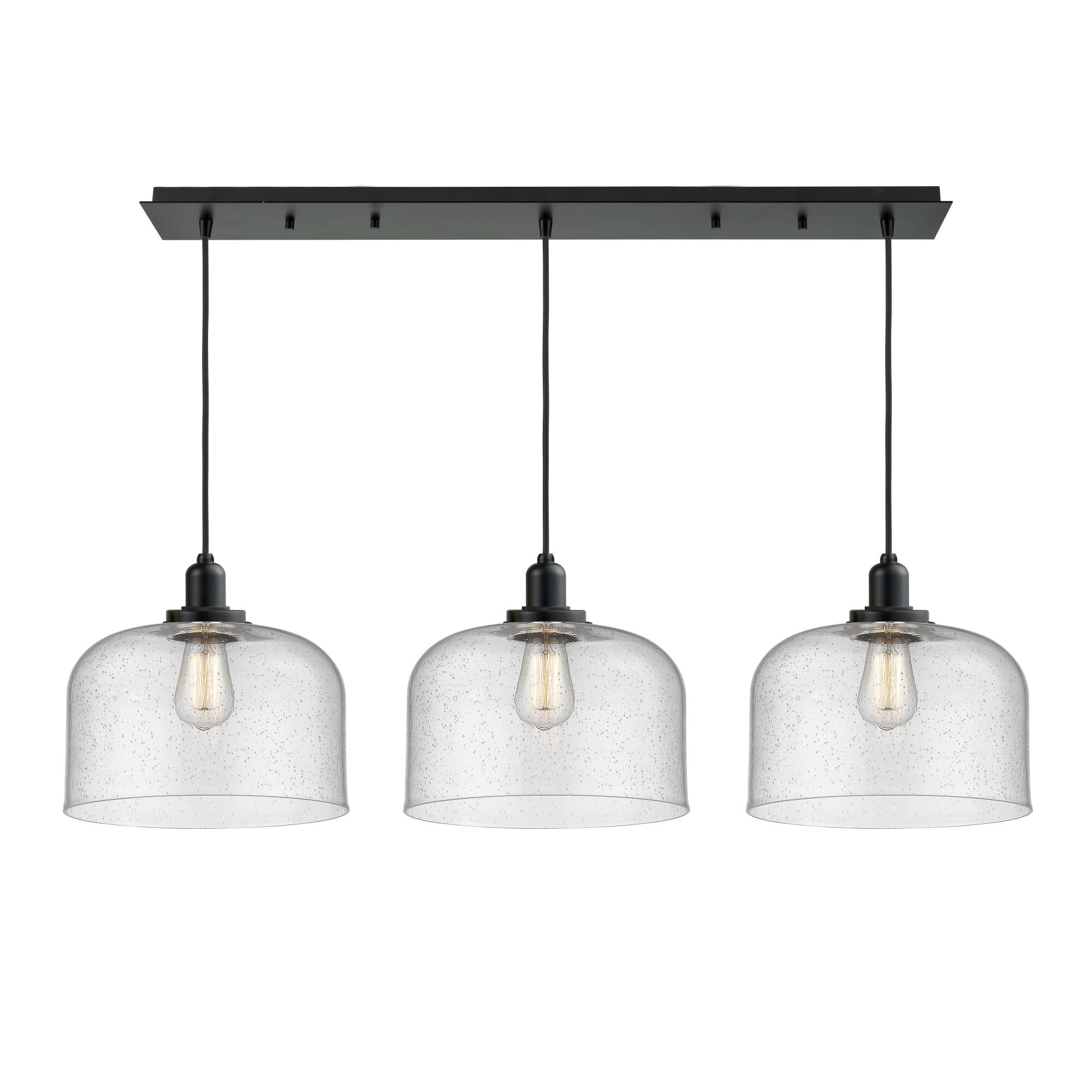 Shown in Matte Black finish and Bell glass and Glass shade and Matte Black Whitney Socket Cover accent