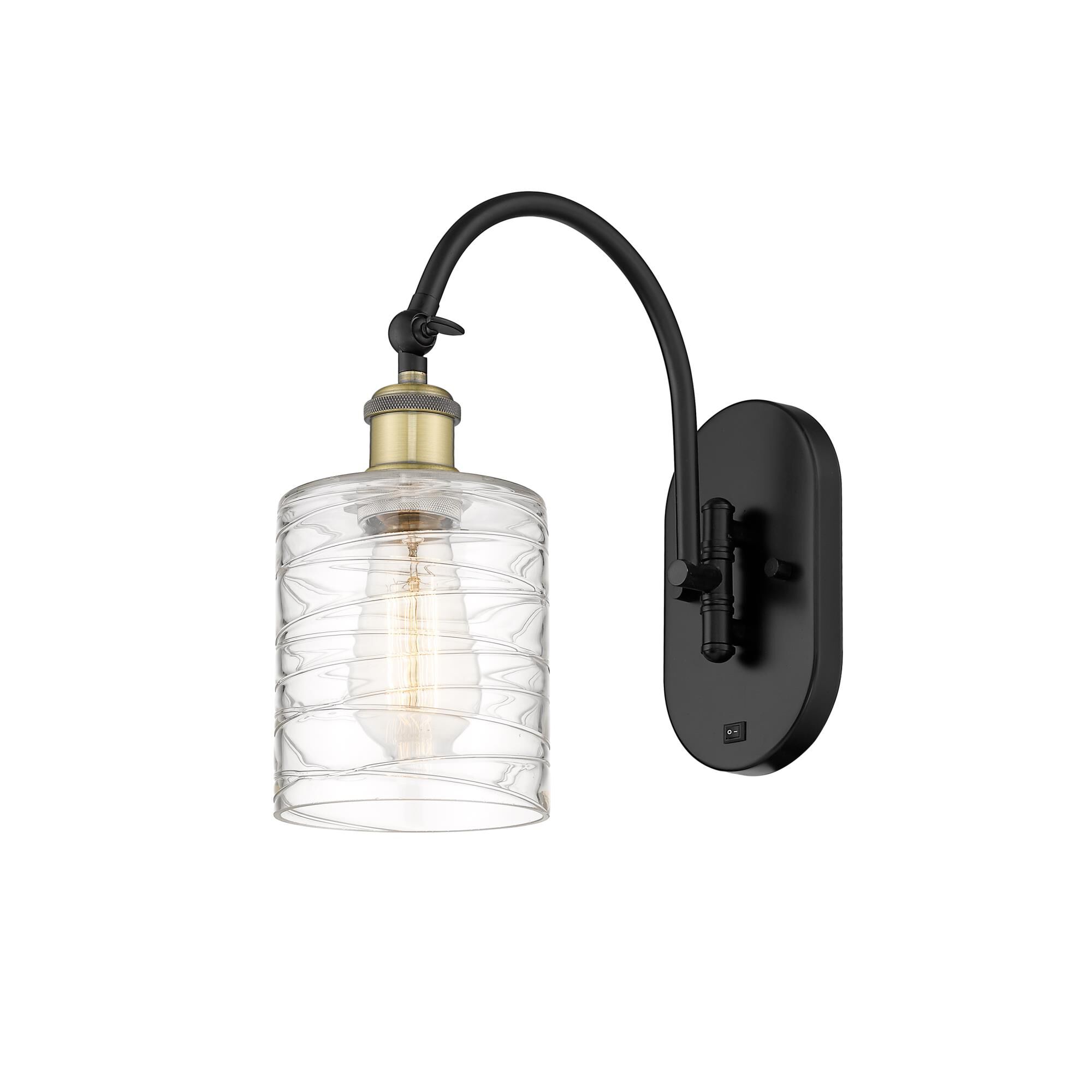 Shown in Black Antique Brass finish and Deco Swirl glass