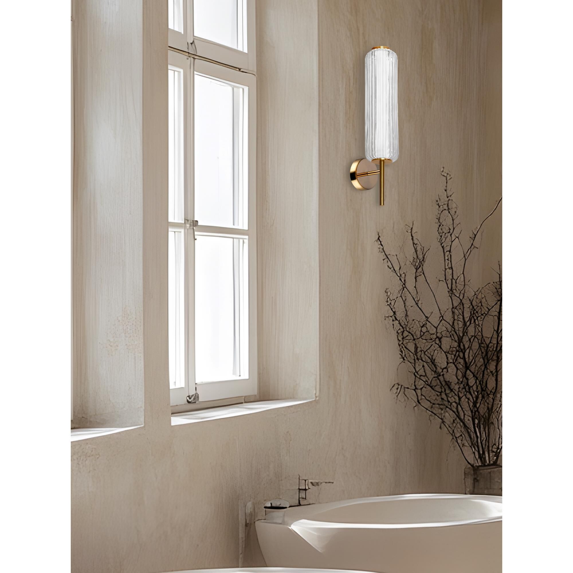 Shown in Aged Brass finish and Clear glass