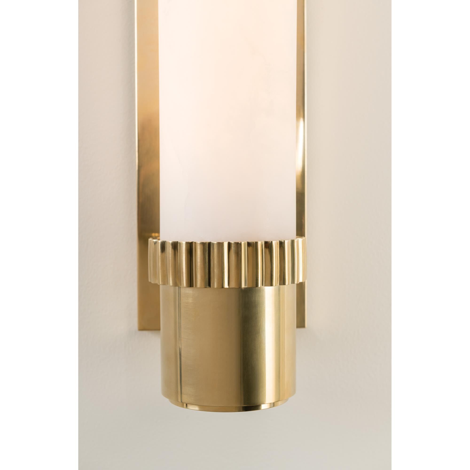 Shown in Aged Brass finish and Alabaster glass