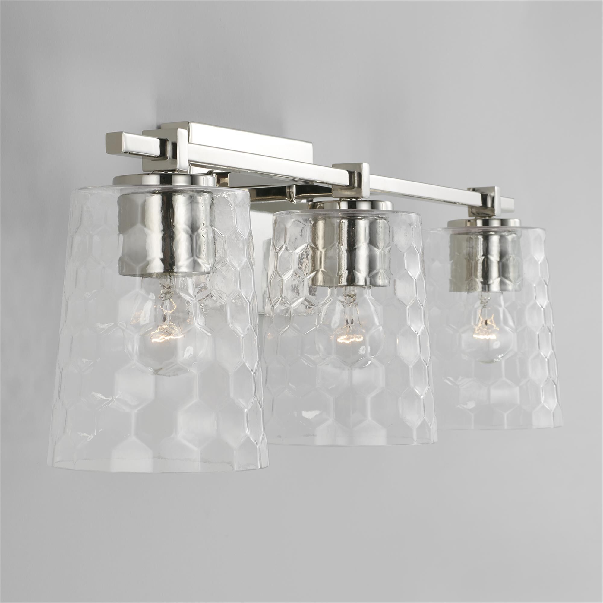 Shown in Polished Nickel finish and Clear Honeycomb glass