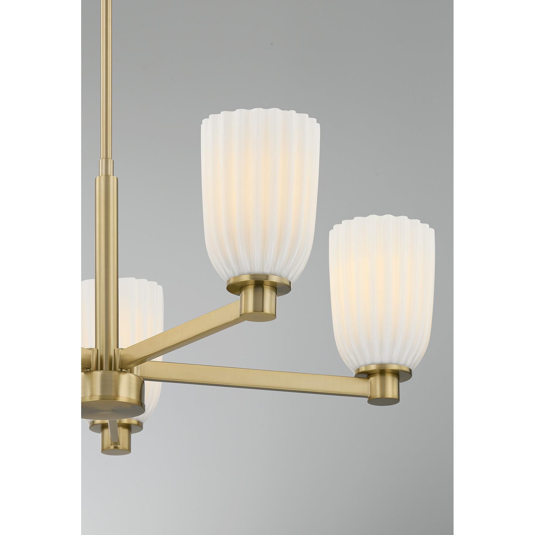Shown in Noble Brass finish and White Opal Ribbed glass