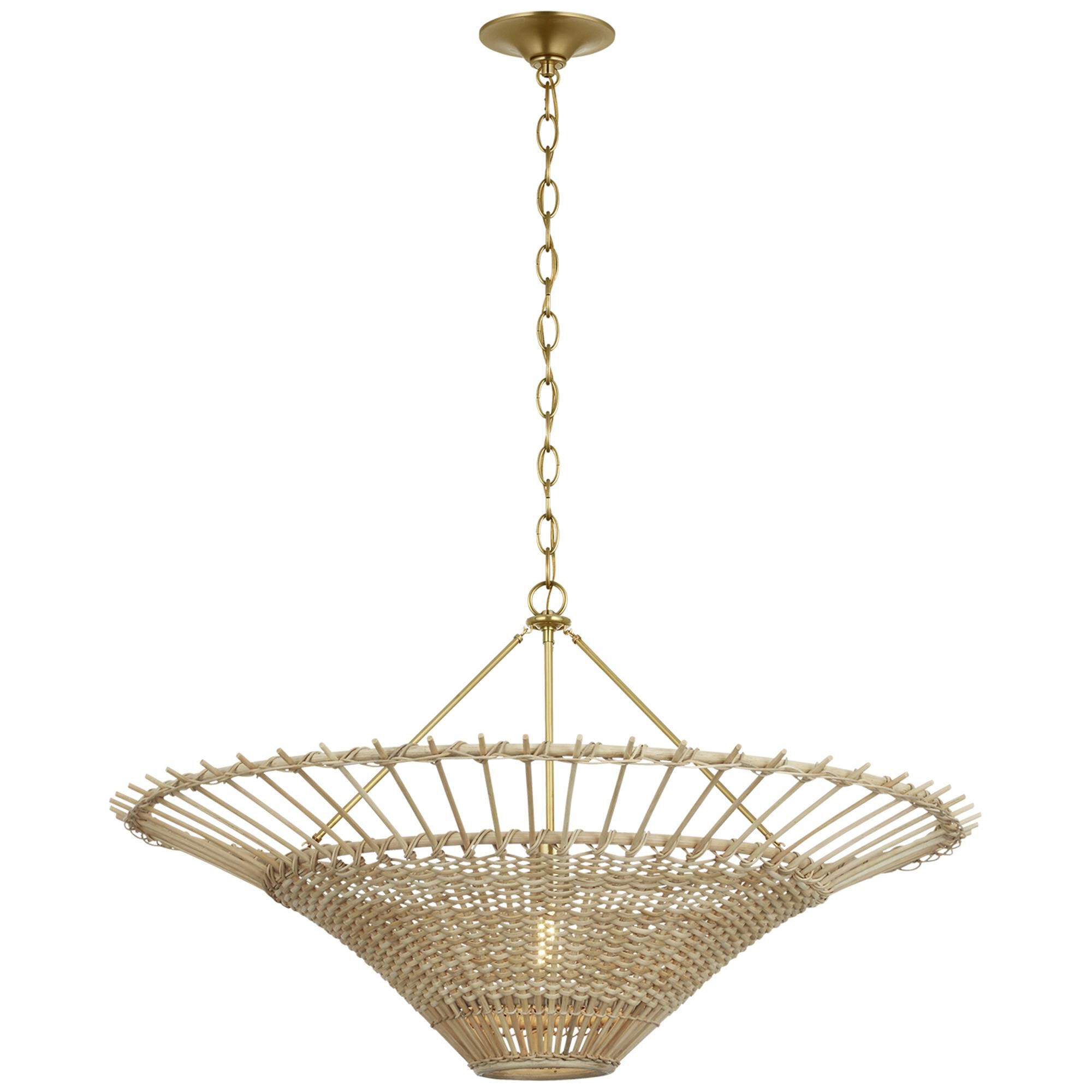 Shown in Hand-Rubbed Antique Brass finish and Blonde Wicker shade