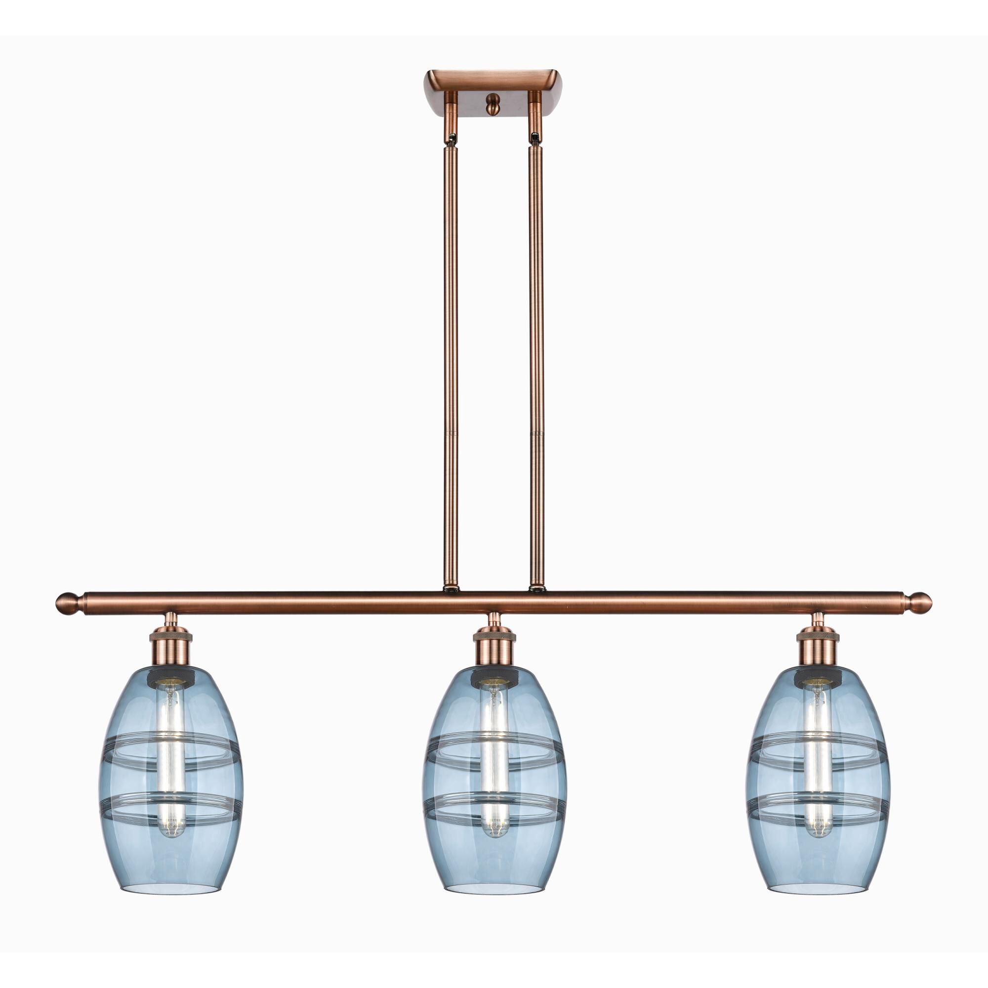 Shown in Antique Copper finish and Princess Blue glass