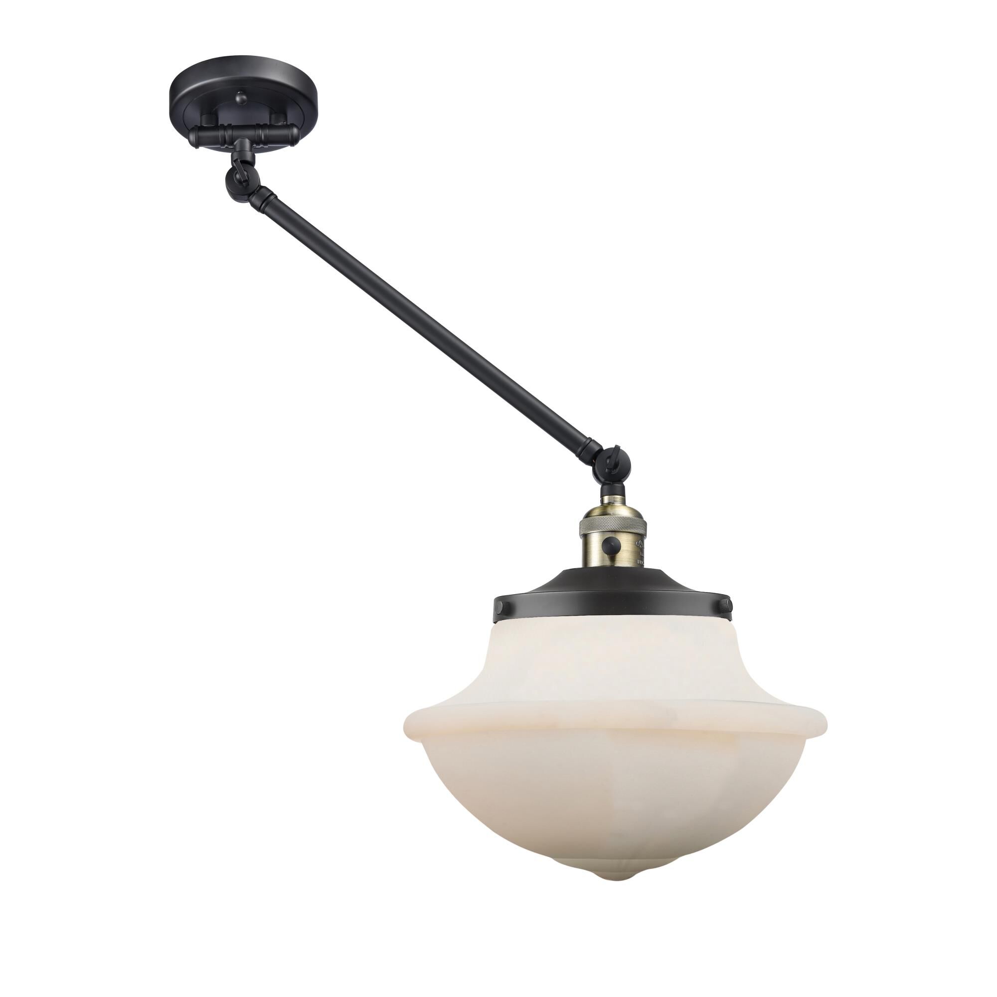 Shown in Black Antique Brass finish and Matte White glass